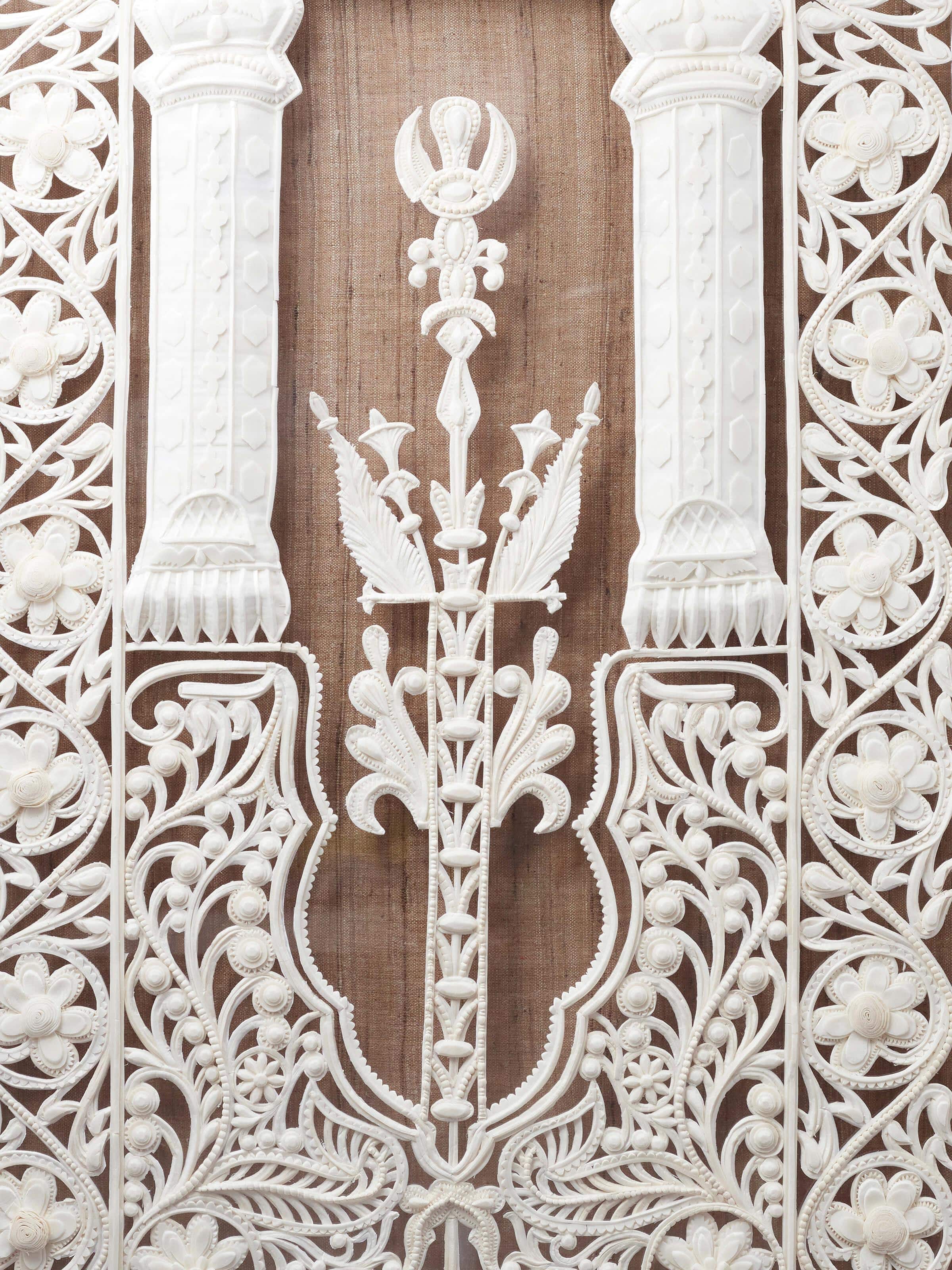 Side view of Sholapith jharokha wall hanging highlighting detailed patterns