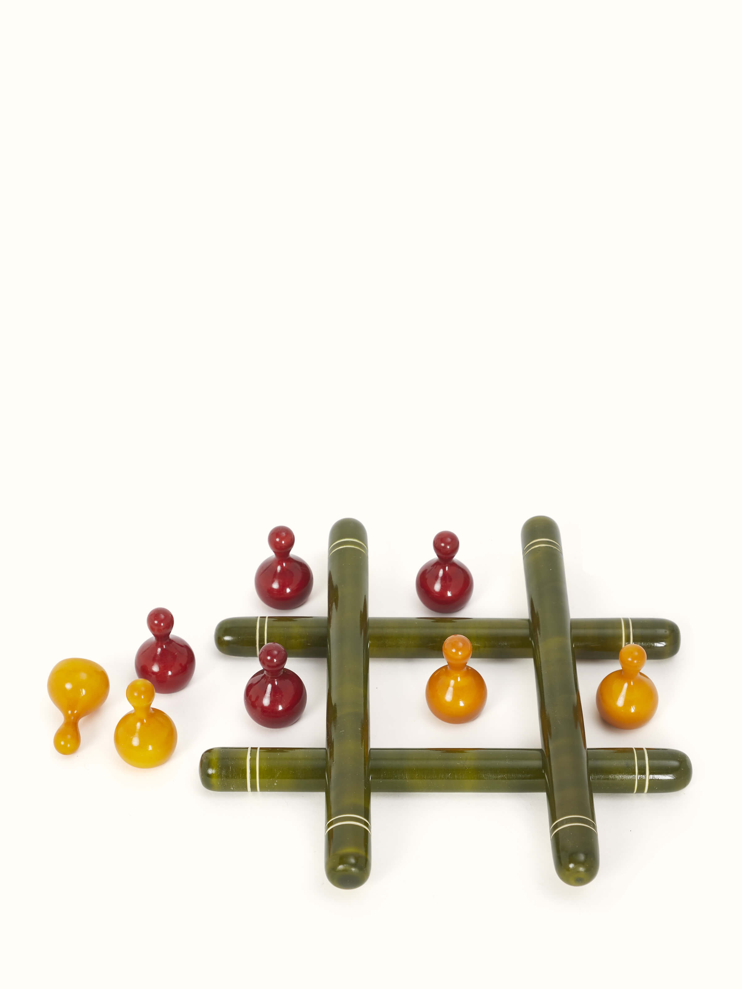 Front view of Channapatna Wooden Tic-Tac-Toe Set by Swadesh highlighting its colorful wooden pieces and traditional craftsmanship.
