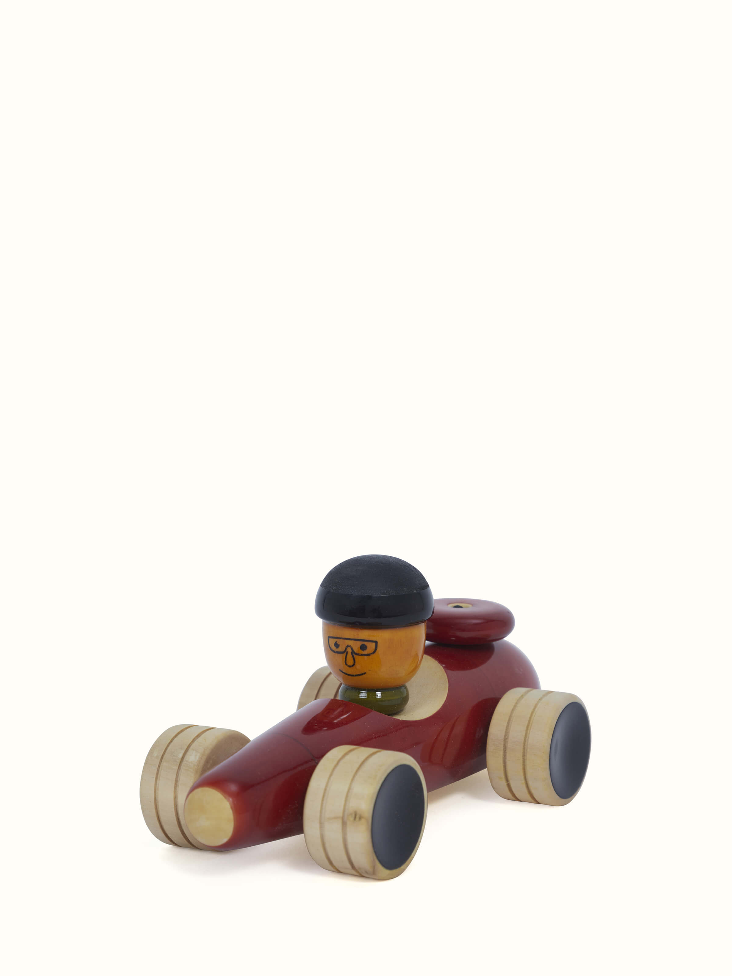 Side view of Channapatna Wooden Vehicle Toy highlighting the toy's wooden structure and vibrant colors