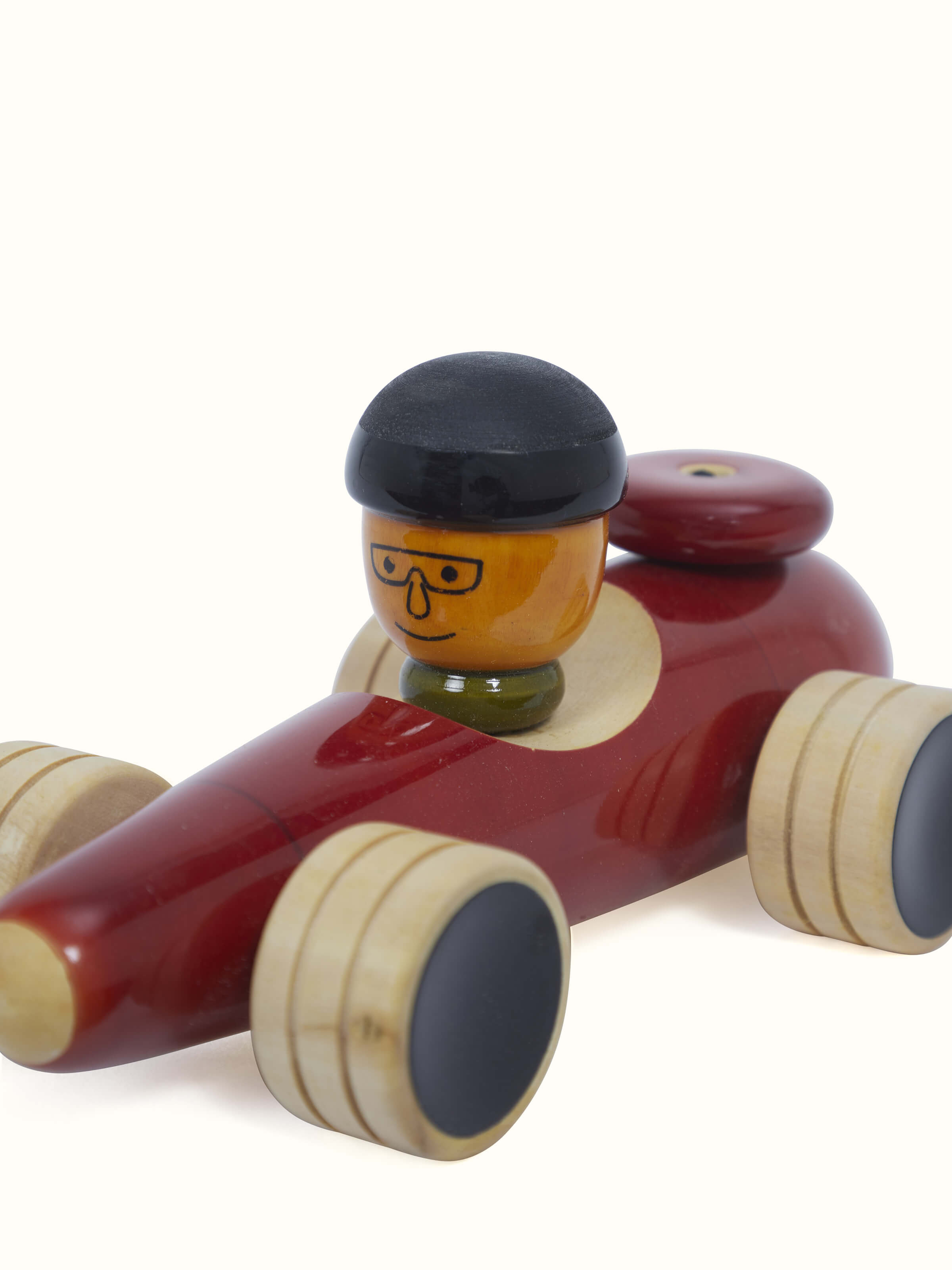 Detailed view of Channapatna Wooden Vehicle Toy capturing its playful design and polished finish