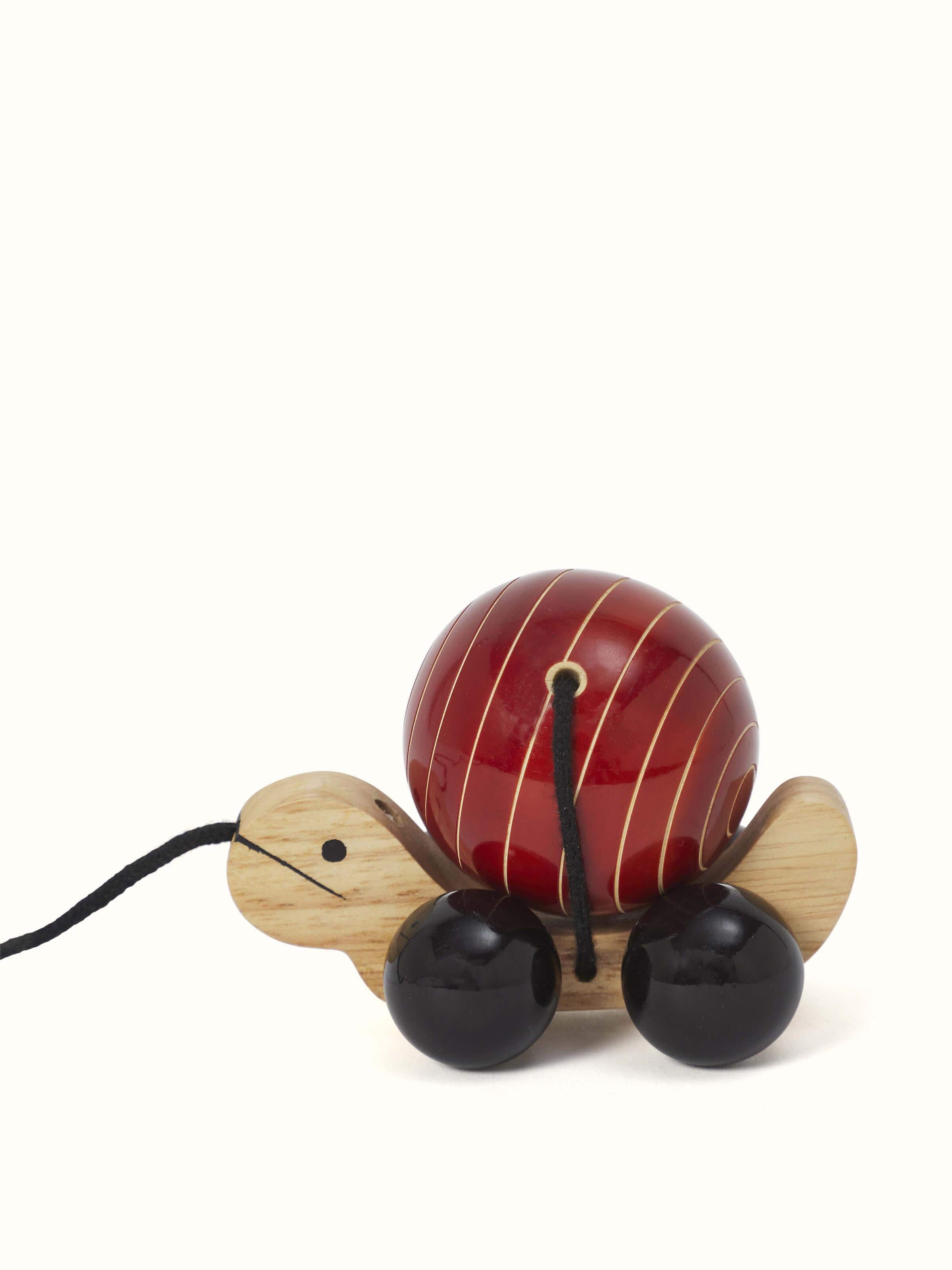 Front view of Channapatna Wooden Pull-along Toy displaying its smooth edges and colorful design