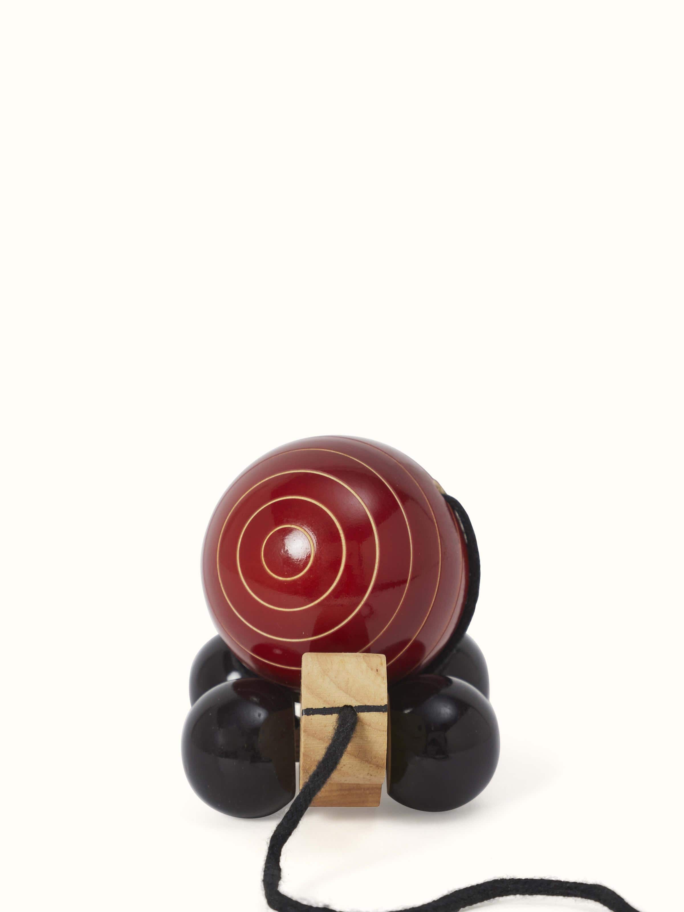 Angled view of Channapatna Wooden Pull-along Toy highlighting its smooth, easy-to-pull design