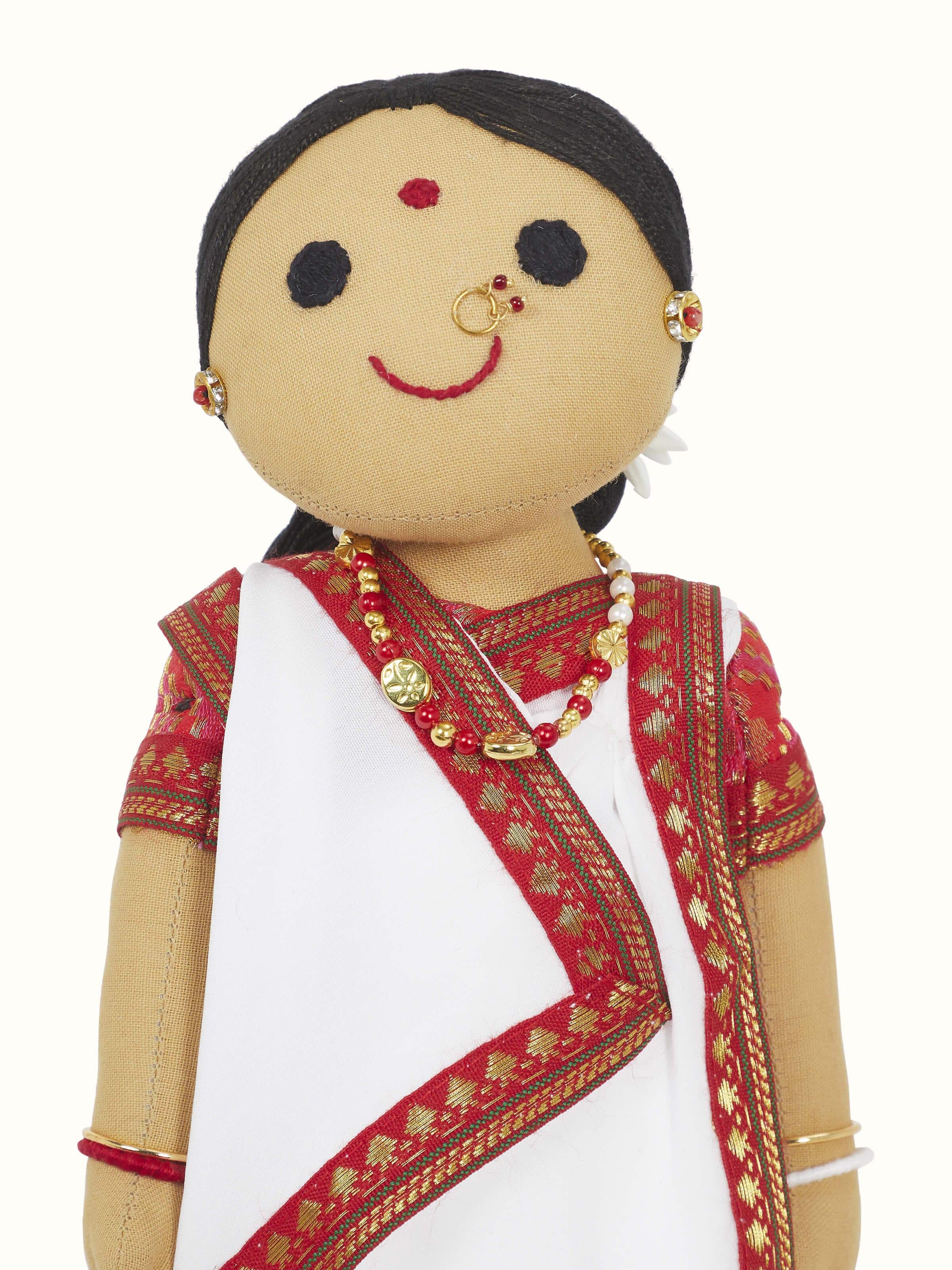 Full view of the crocheted cotton Bengali girl soft toy, emphasizing the craftsmanship and playful design.