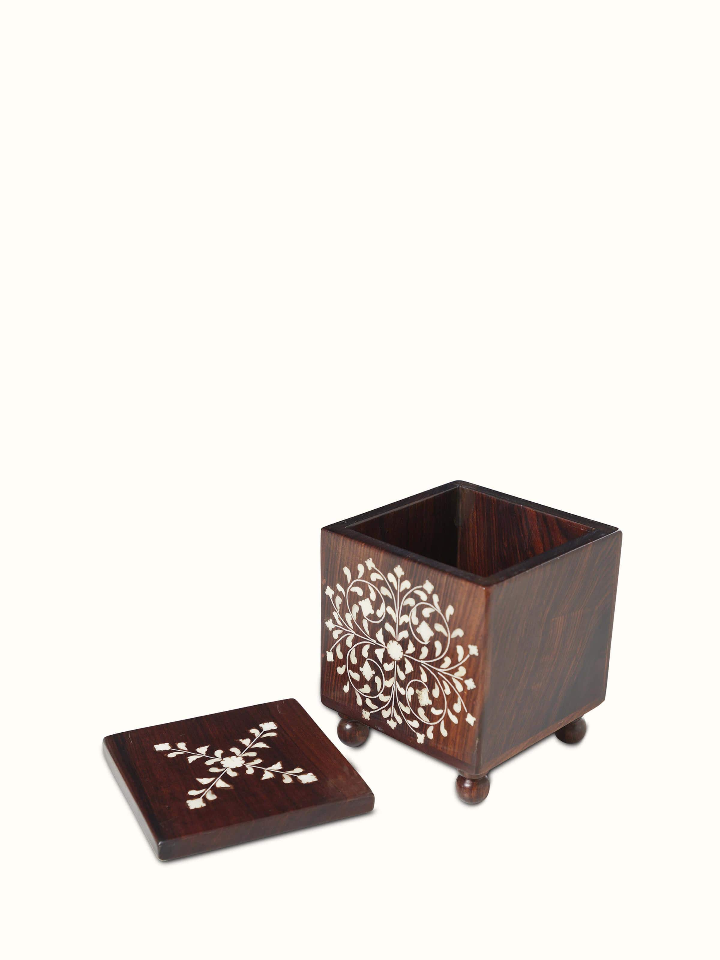 Full view of Sheesham wood and bone inlaid storage box, emphasizing its artistic patterns and robust construction.