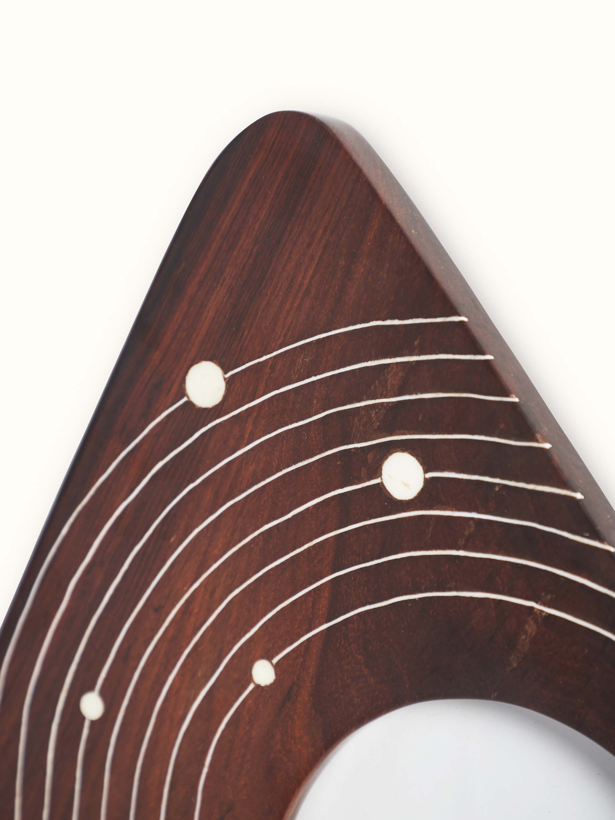 Overhead view of Natural sheesham wood & bone inlaid photo frame displaying the rich wood texture