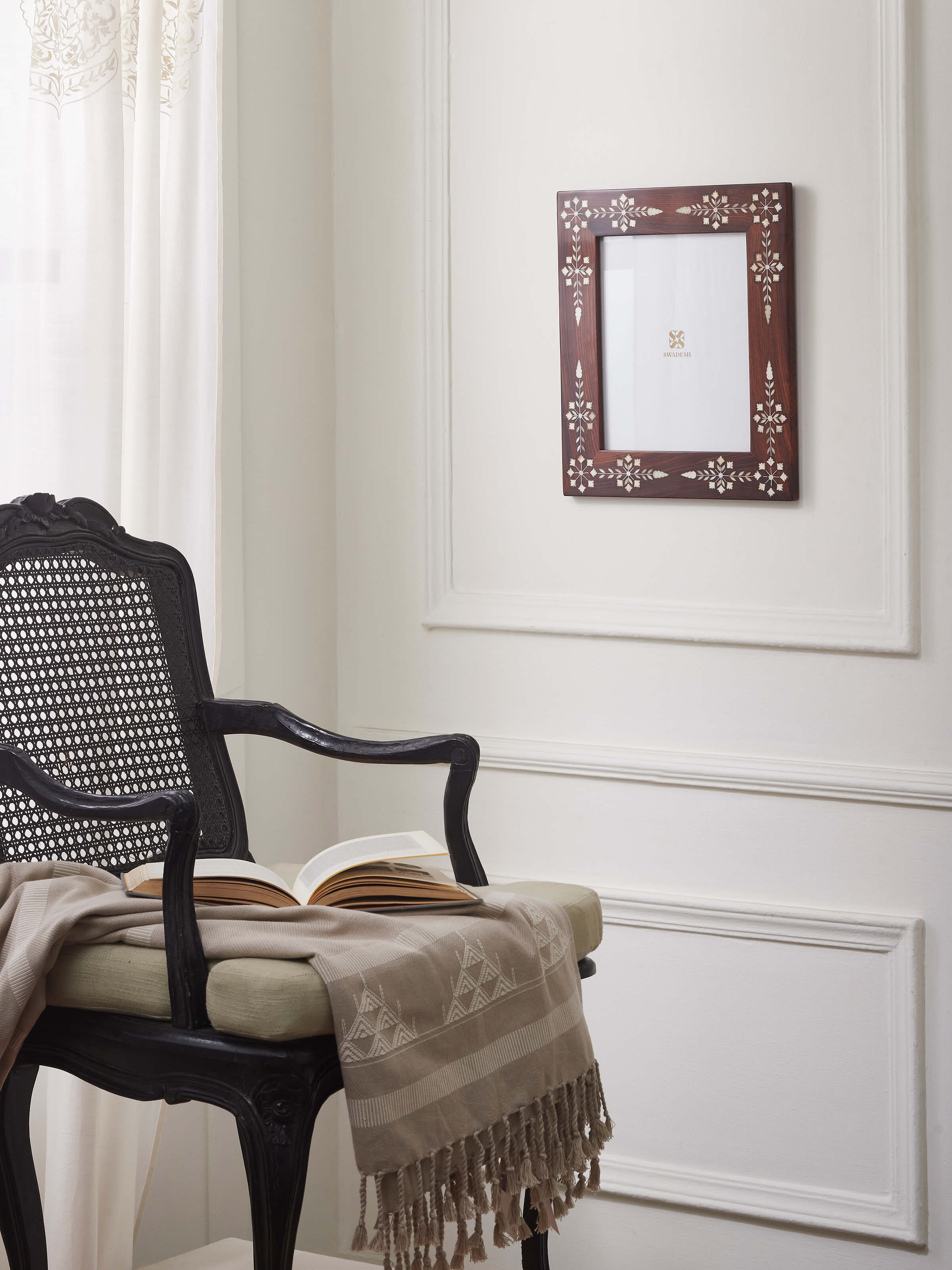 Close-up view of the sheesham wood and bone inlaid photo frame, highlighting the detailed inlay work and craftsmanship.