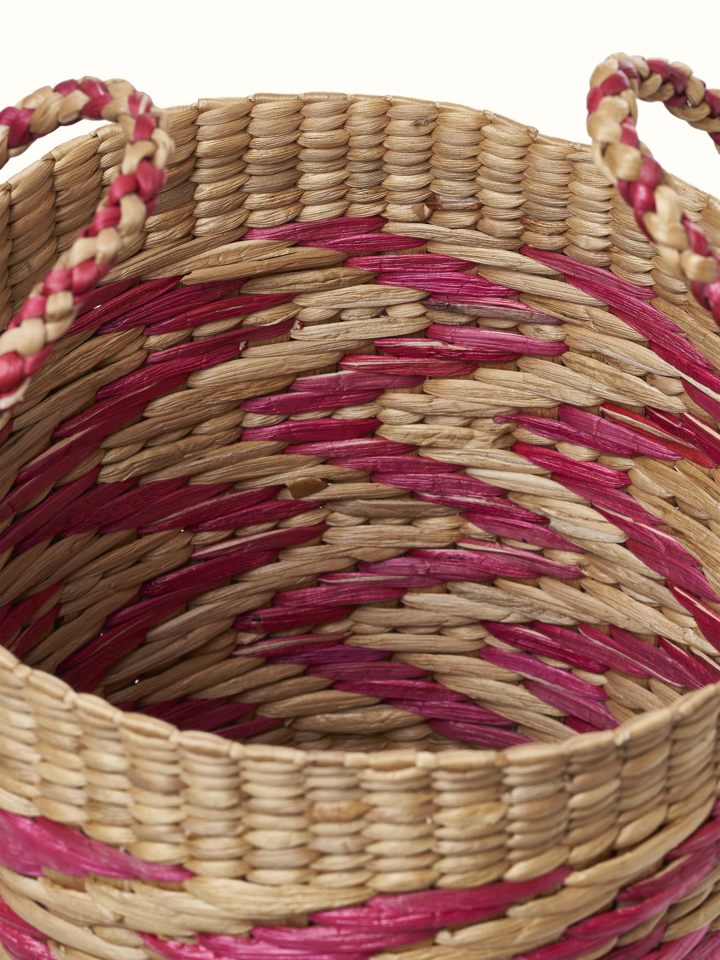 Angle view of natural water hyacinth fibre waste bin multicolor showcasing overall design and function