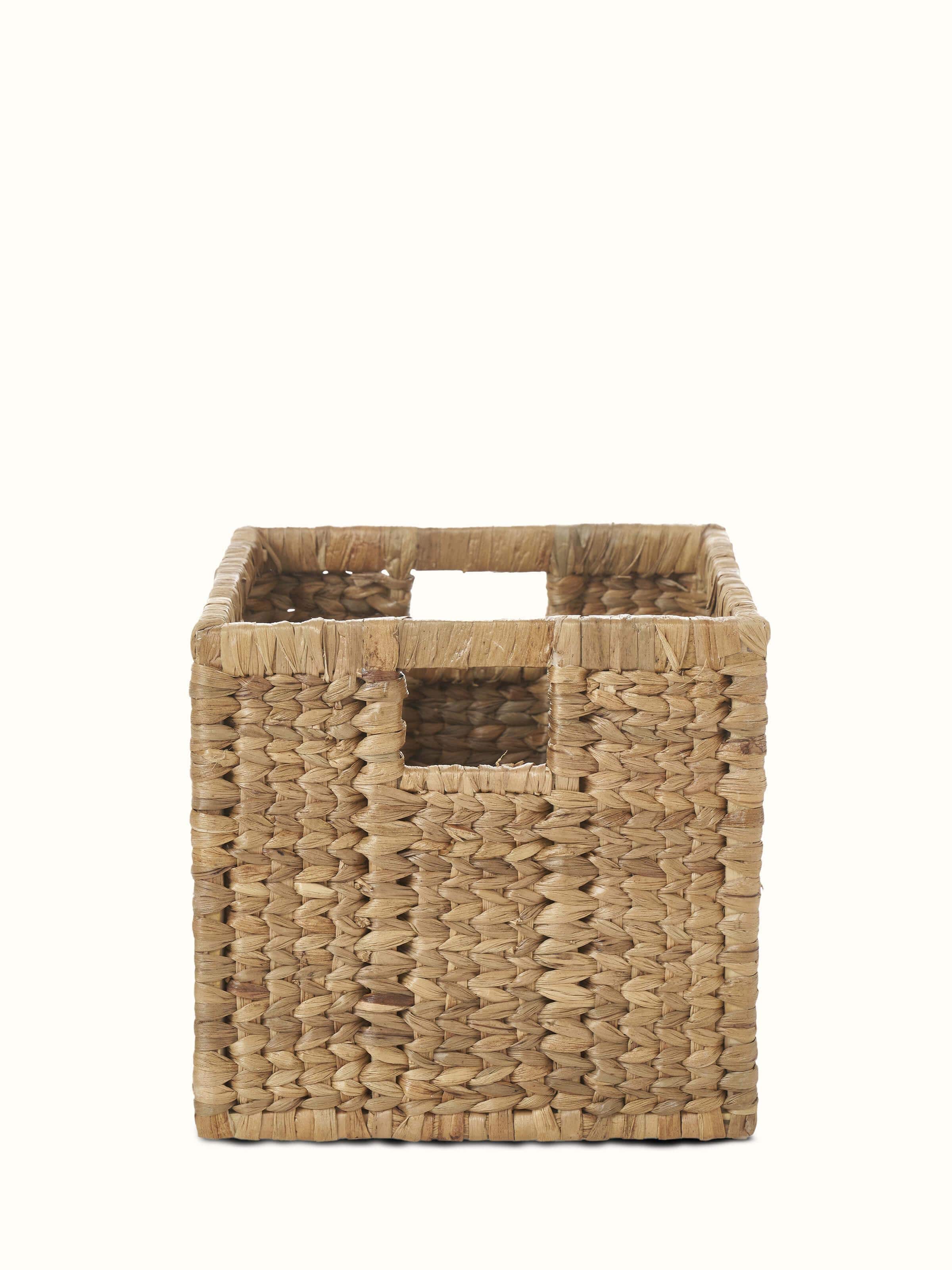 Front view of traditional natural water hyacinth fibre storage organiser, highlighting the woven texture and design.