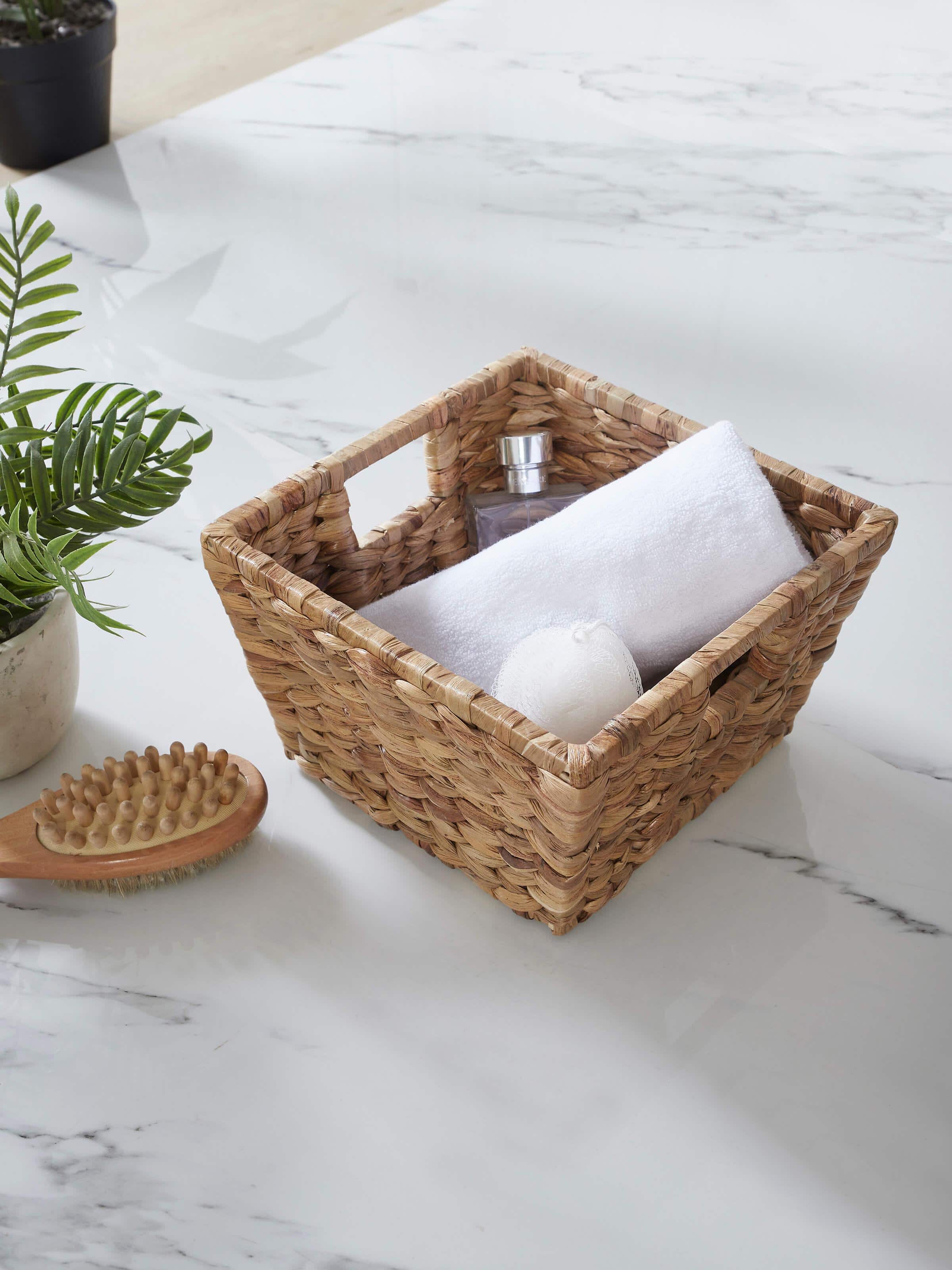 Close-up of natural water hyacinth fibre storage organiser, highlighting its texture and natural fibers.