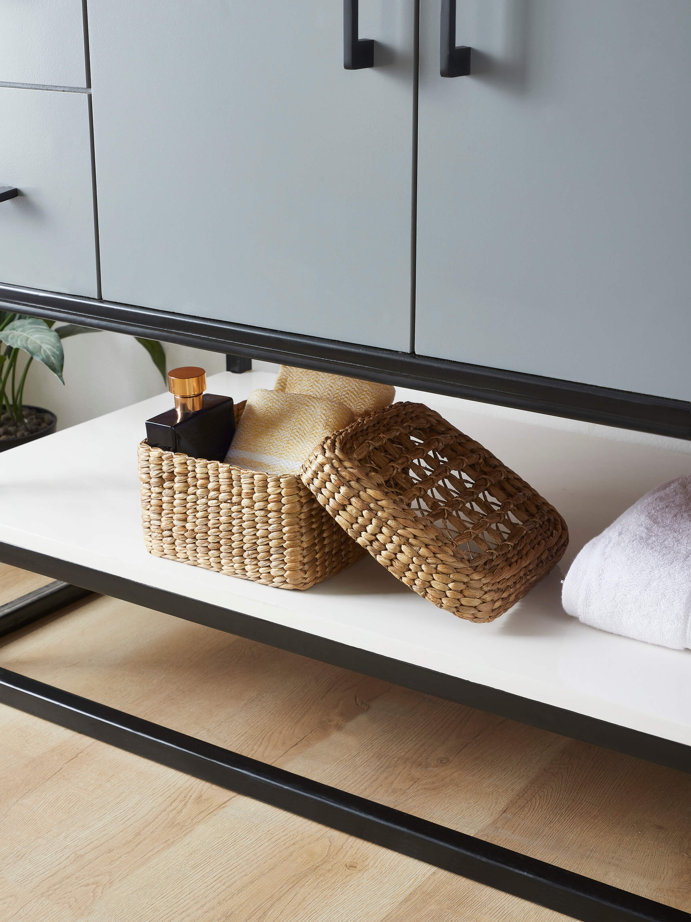 Side view of natural water hyacinth fibre storage basket, showcasing the craftsmanship.