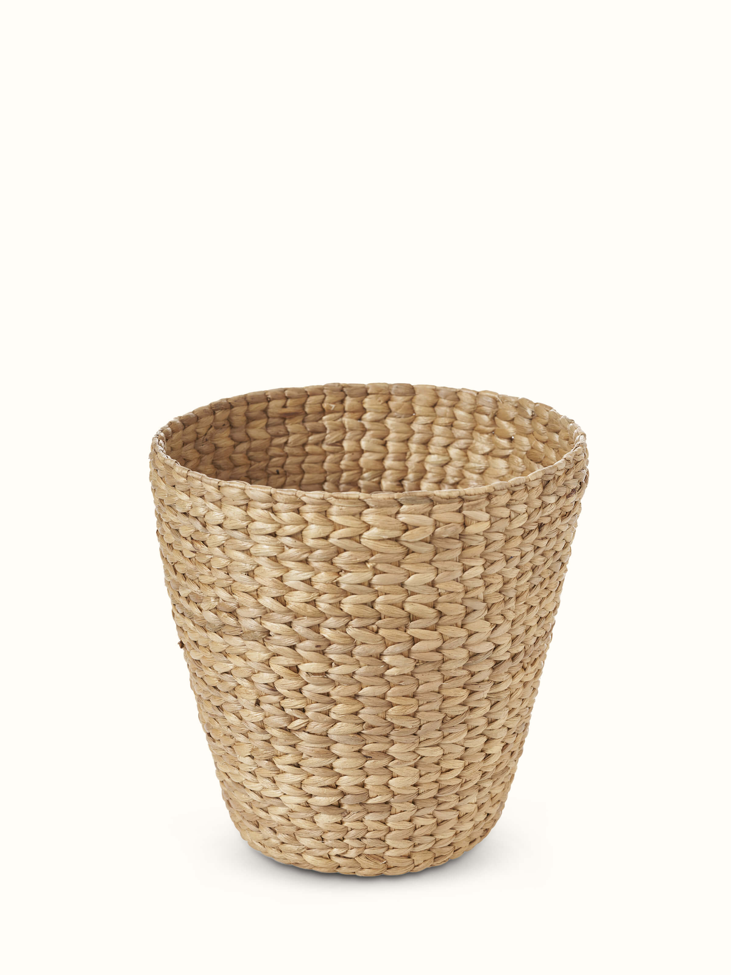 Detailed view of Natural water hyacinth fibre waste bin focusing on the texture and craftsmanship of the woven fiber