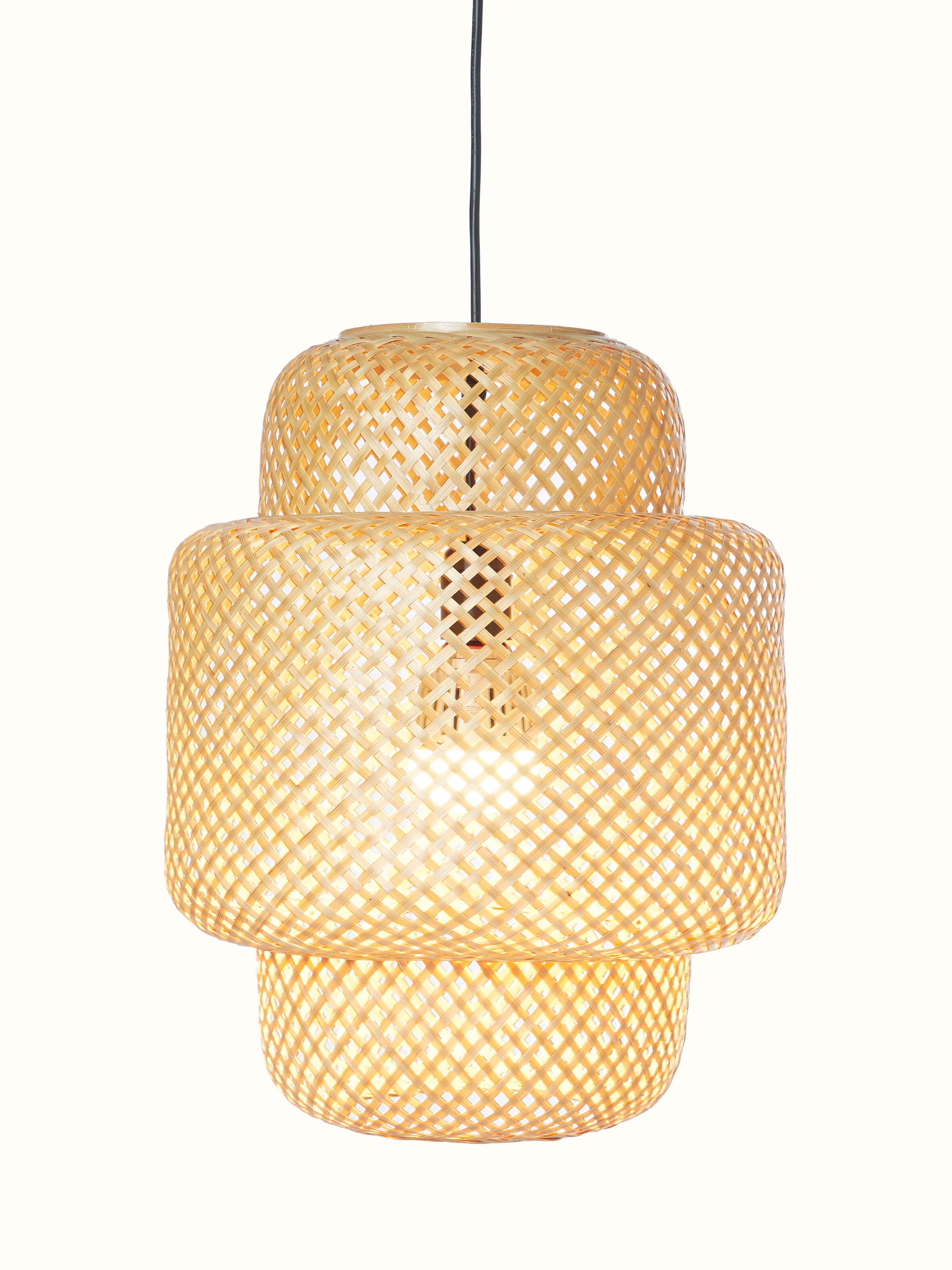 Angled view of Bamboo LED pendant light medium emphasizing the blend of natural bamboo and contemporary LED technology.