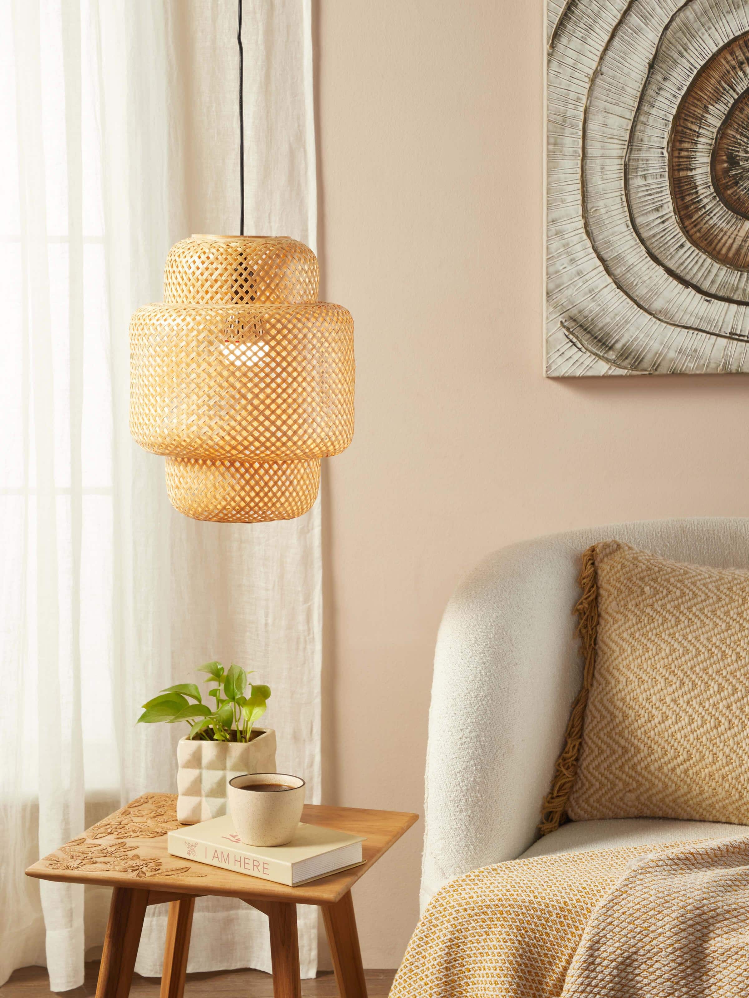 Side view of Bamboo LED pendant light medium highlighting the sleek bamboo structure and modern LED features.