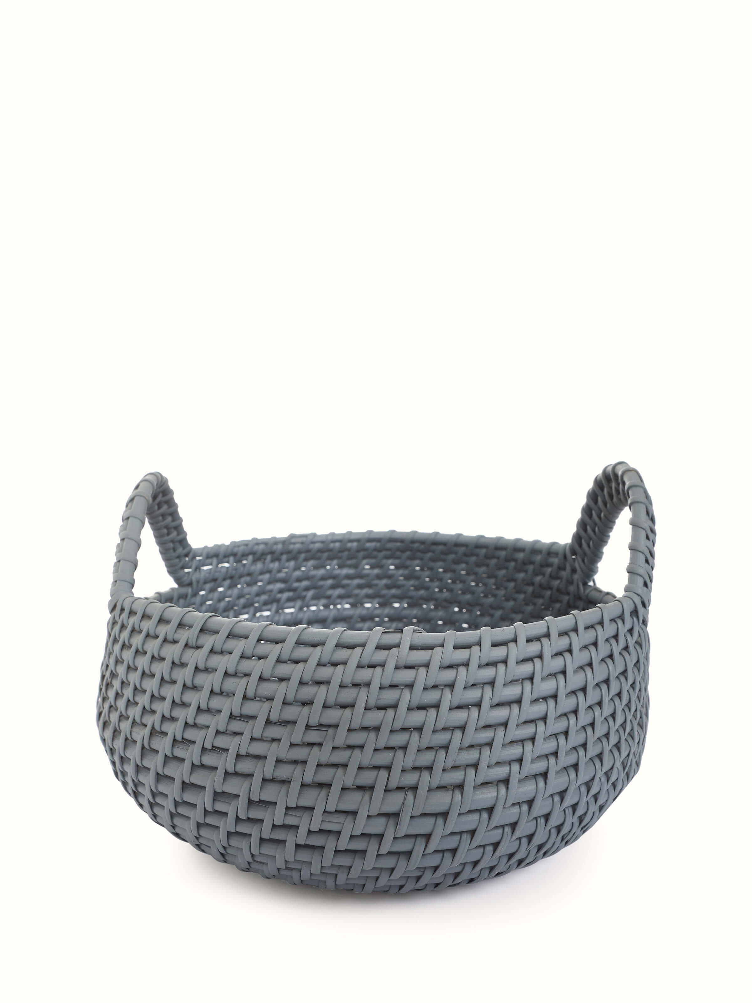 Front view of Cane decorative apple basket in grey color highlighting the woven texture and design.