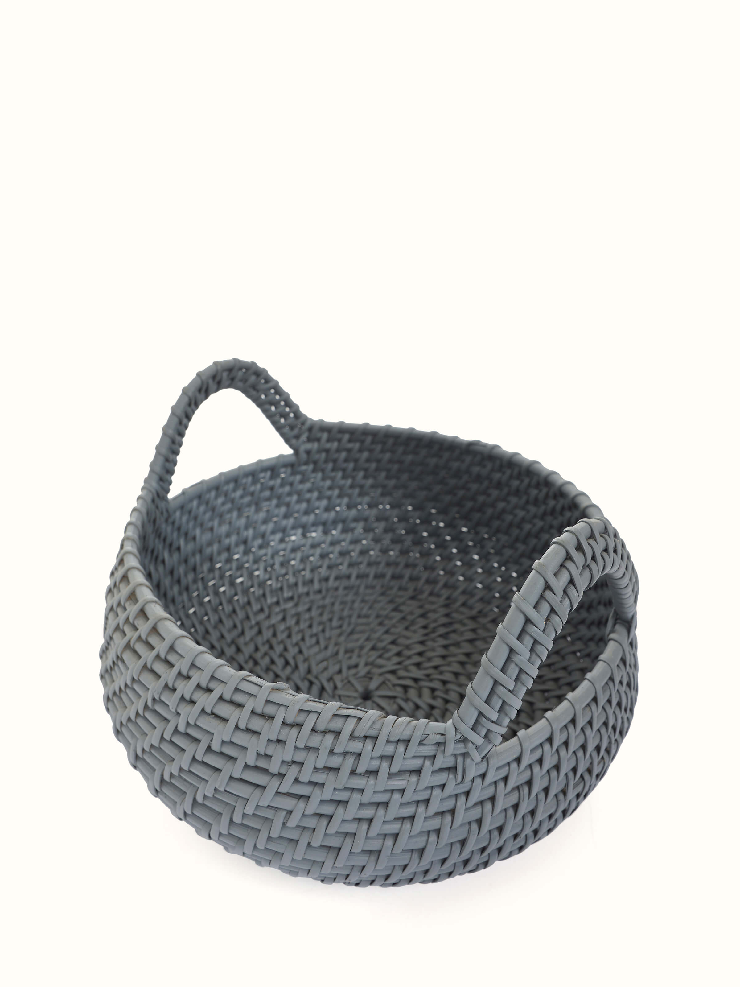 Detailed view of Cane decorative apple basket in grey color focusing on the craftsmanship and texture of the cane.