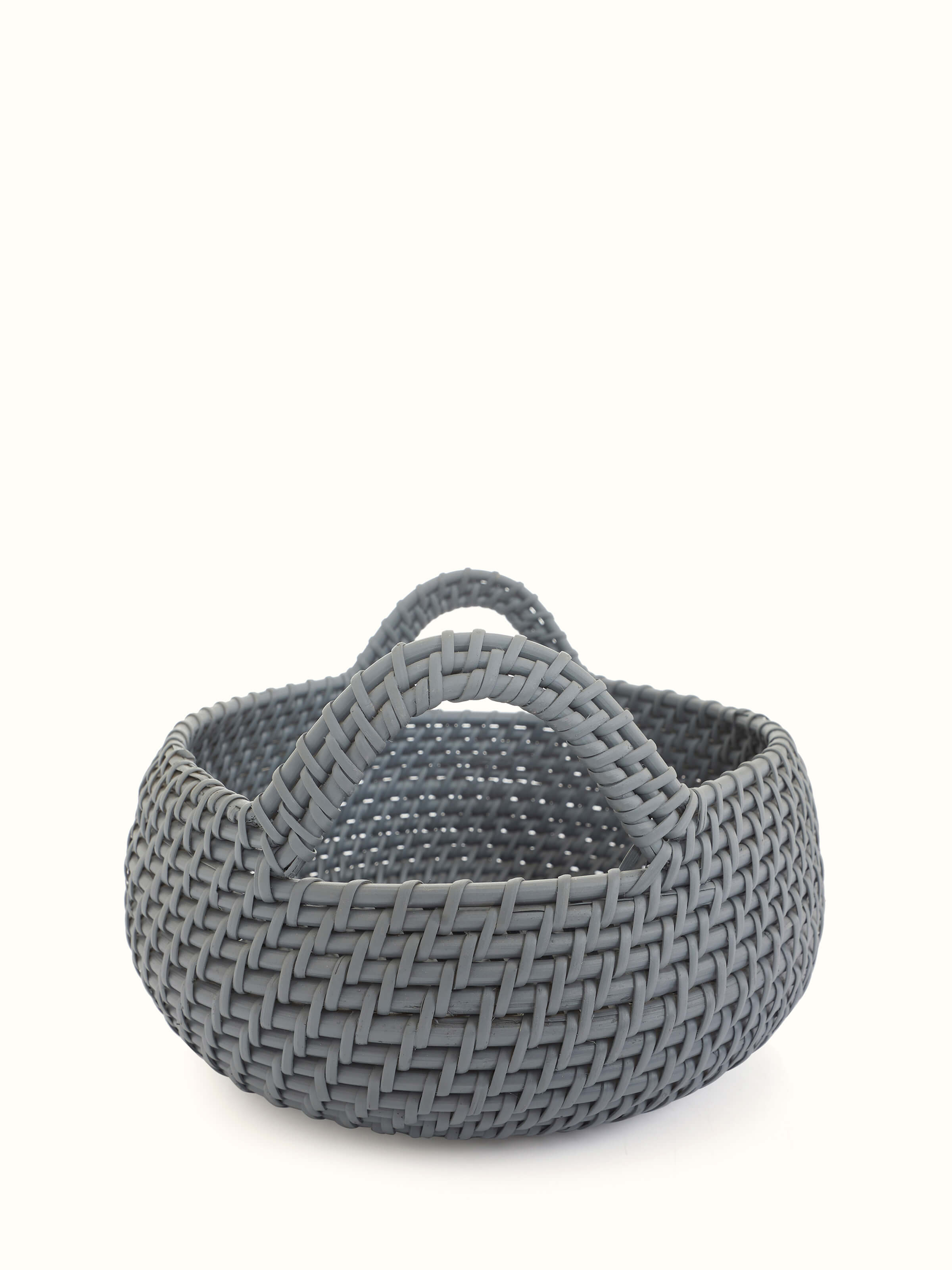 Close-up view of Cane decorative apple basket in grey color emphasizing the intricate design and grey tone.