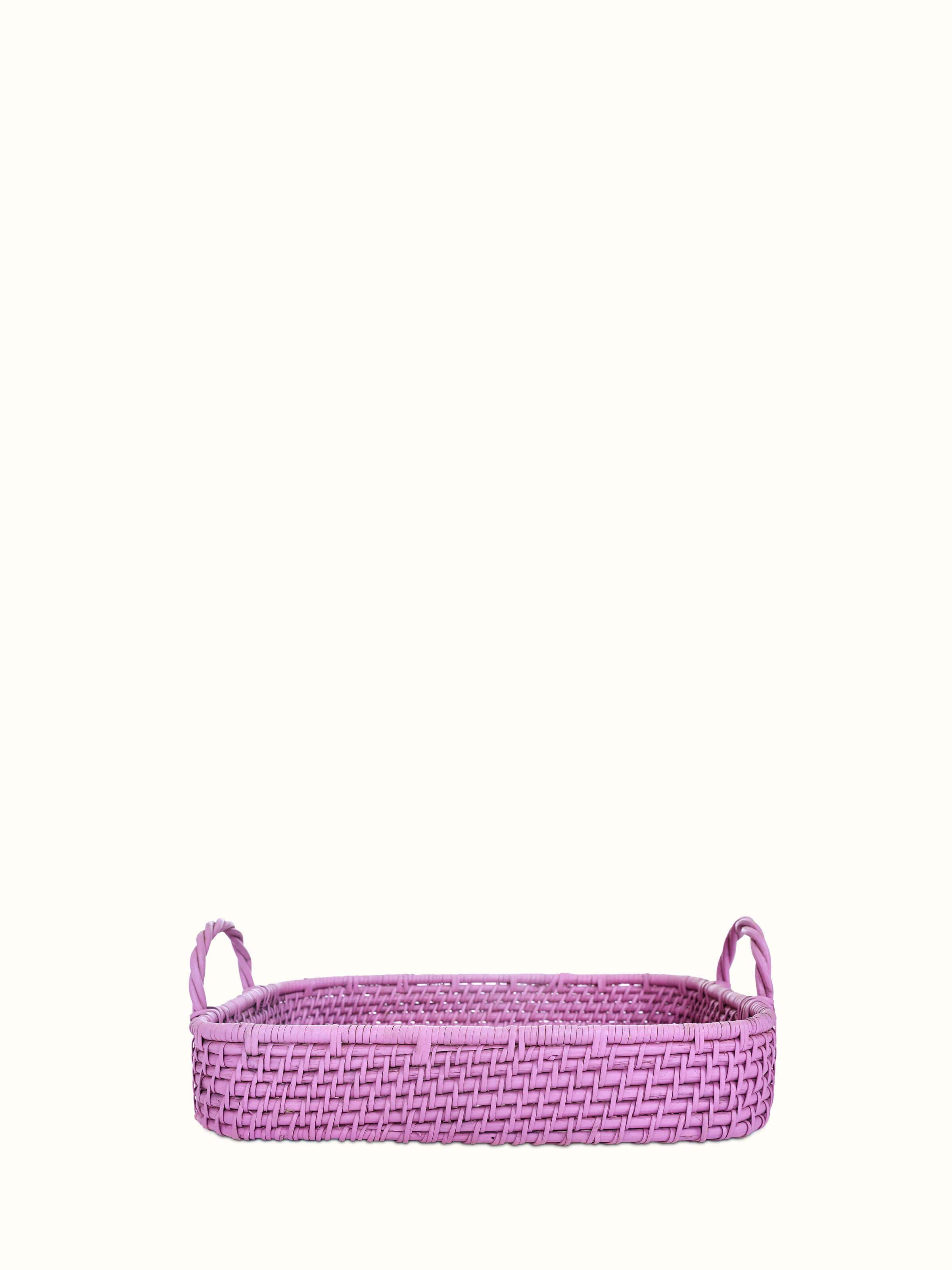 Front view of cane storage organiser in pink color, featuring its spacious compartments and elegant design