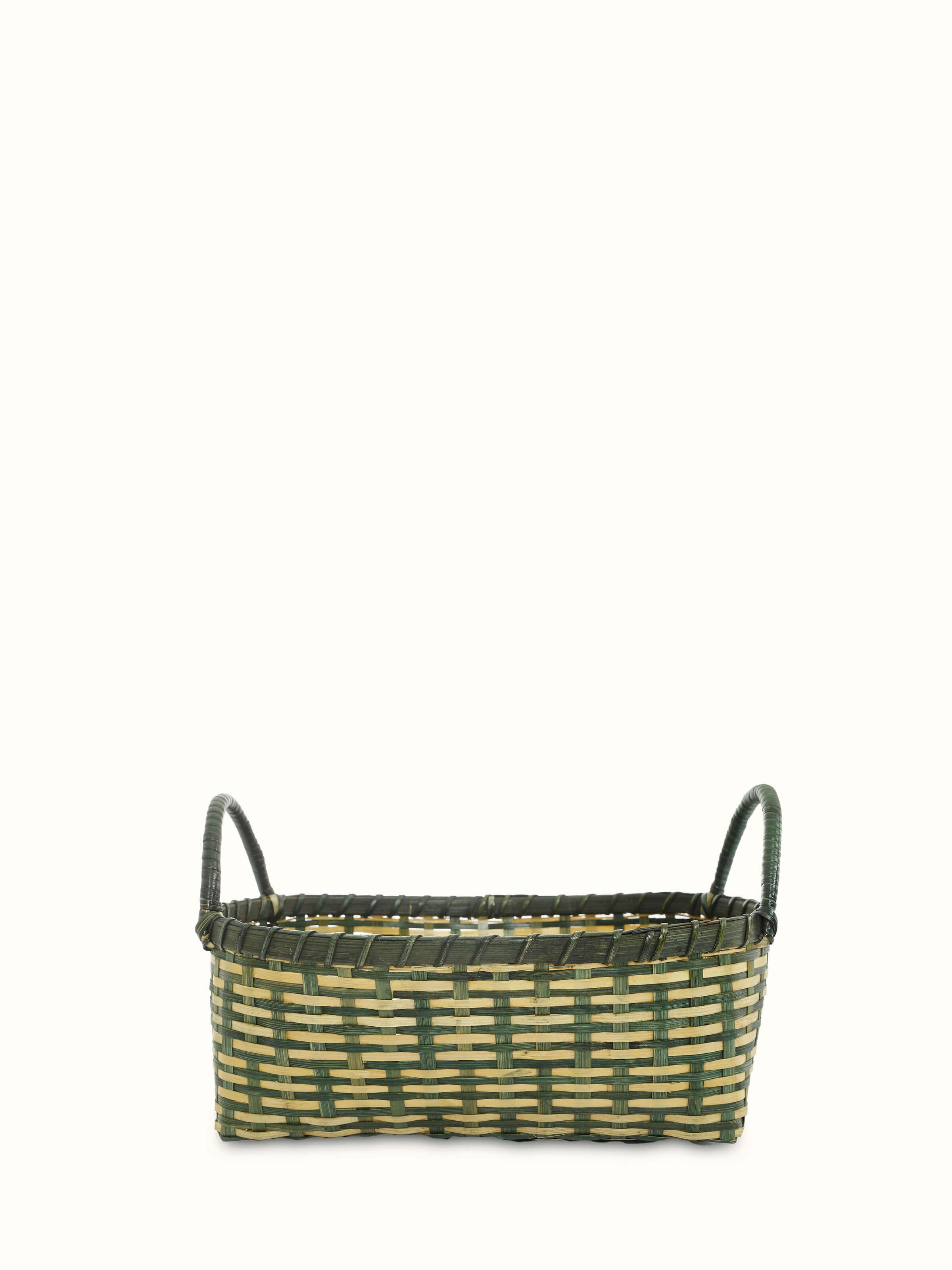 Close-up view of bamboo storage organiser in green, focusing on the material and construction.