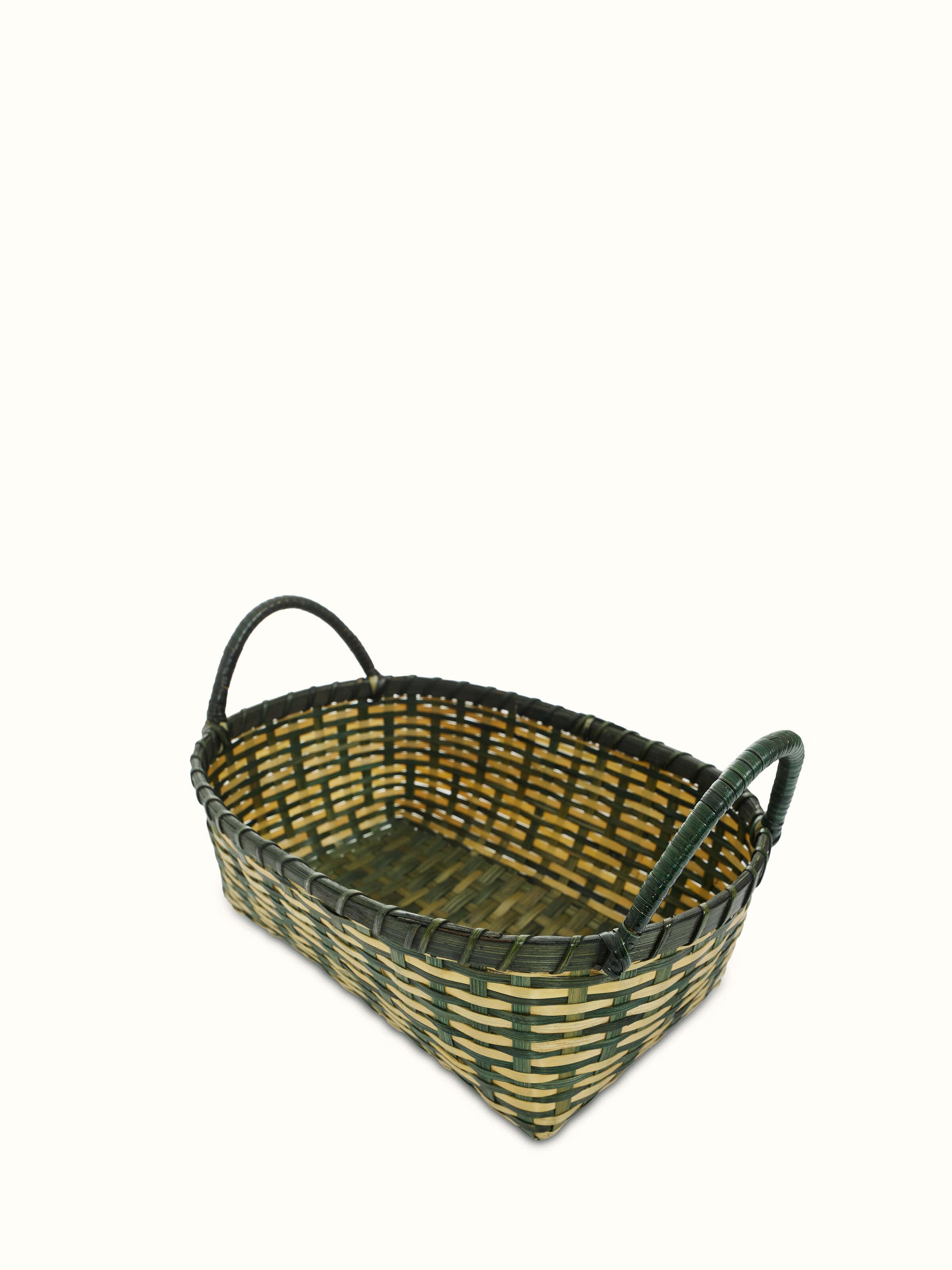 Artistic view of bamboo storage organiser in green, highlighting the design.