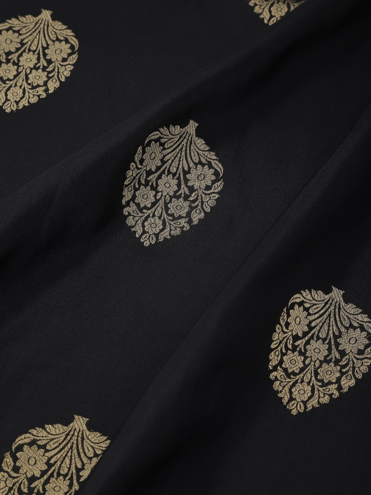 Draped black silk dupatta showcasing its rich texture, elegant fall, and handwoven craftsmanship.