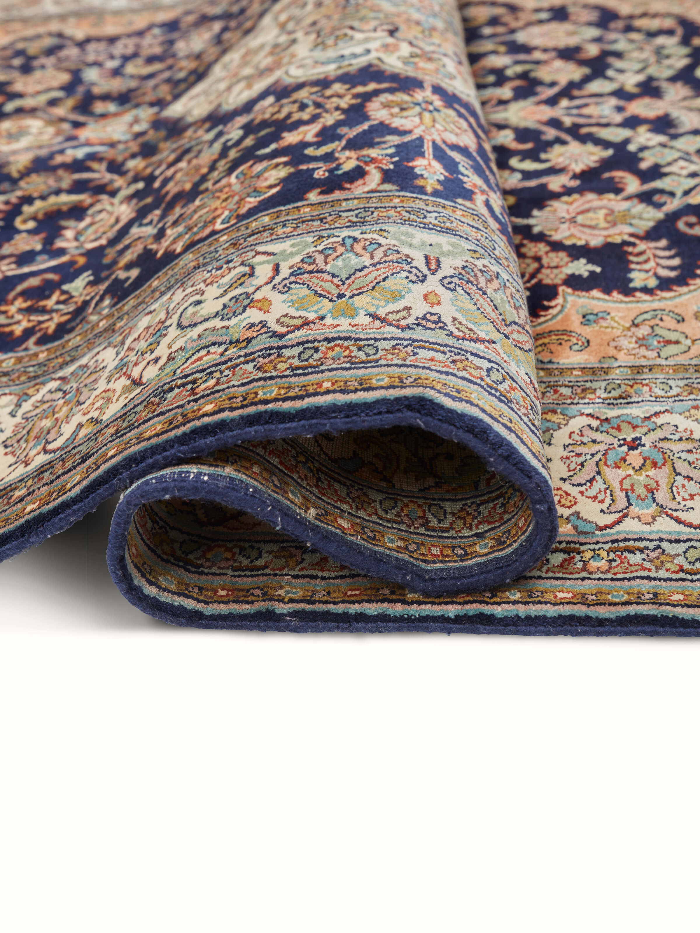 Side view of Traditional Persian Navy Rust Kashan Kashmir Silk Hand-Knotted Carpet showing texture and detail