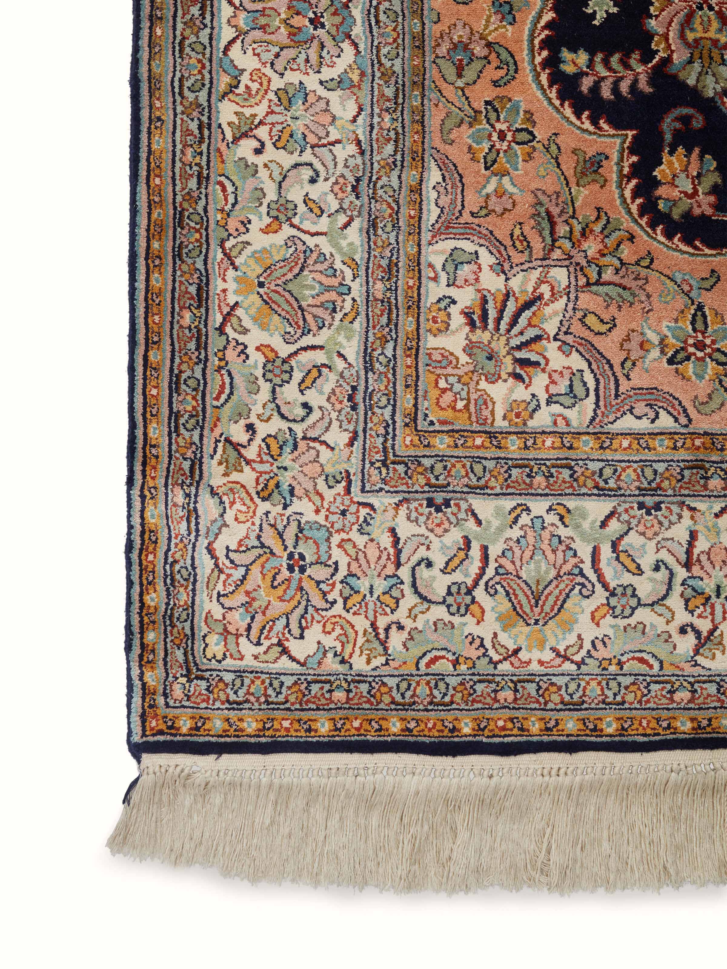 Angled view of Traditional Persian Navy Rust Kashan Kashmir Silk Hand-Knotted Carpet displaying overall design