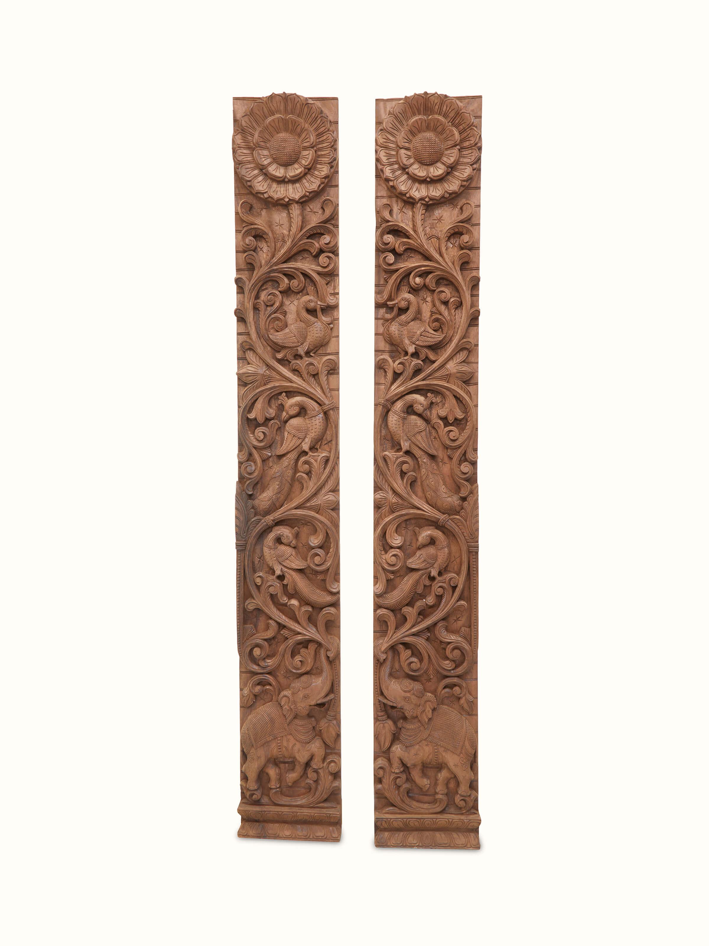 Detail view of Carved Neem Wood Peacock & Elephant Panel emphasizing the craftsmanship and detailed woodwork.