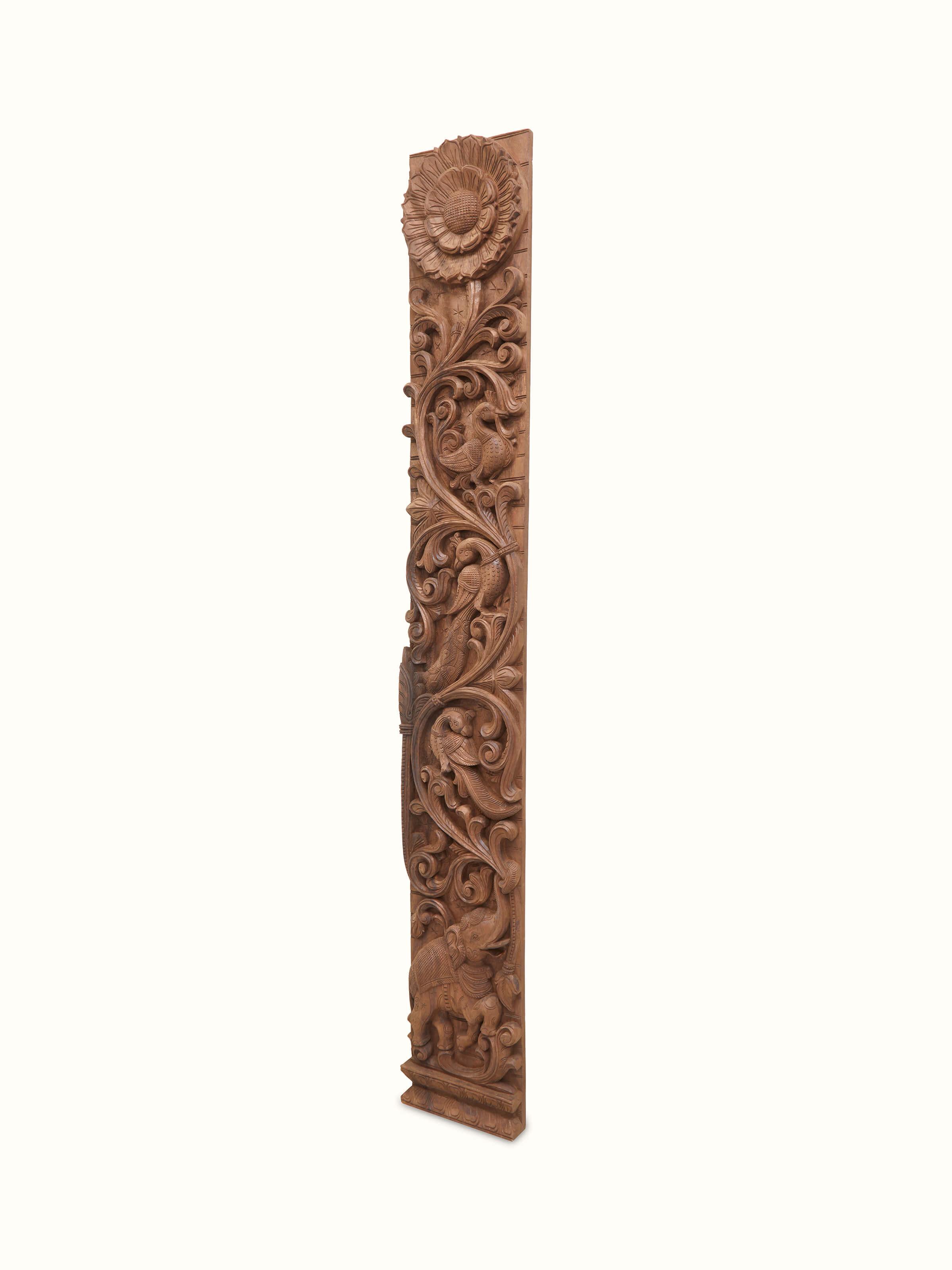 Close-up of Carved Neem Wood Peacock & Elephant Panel focusing on intricate carving details and textures.