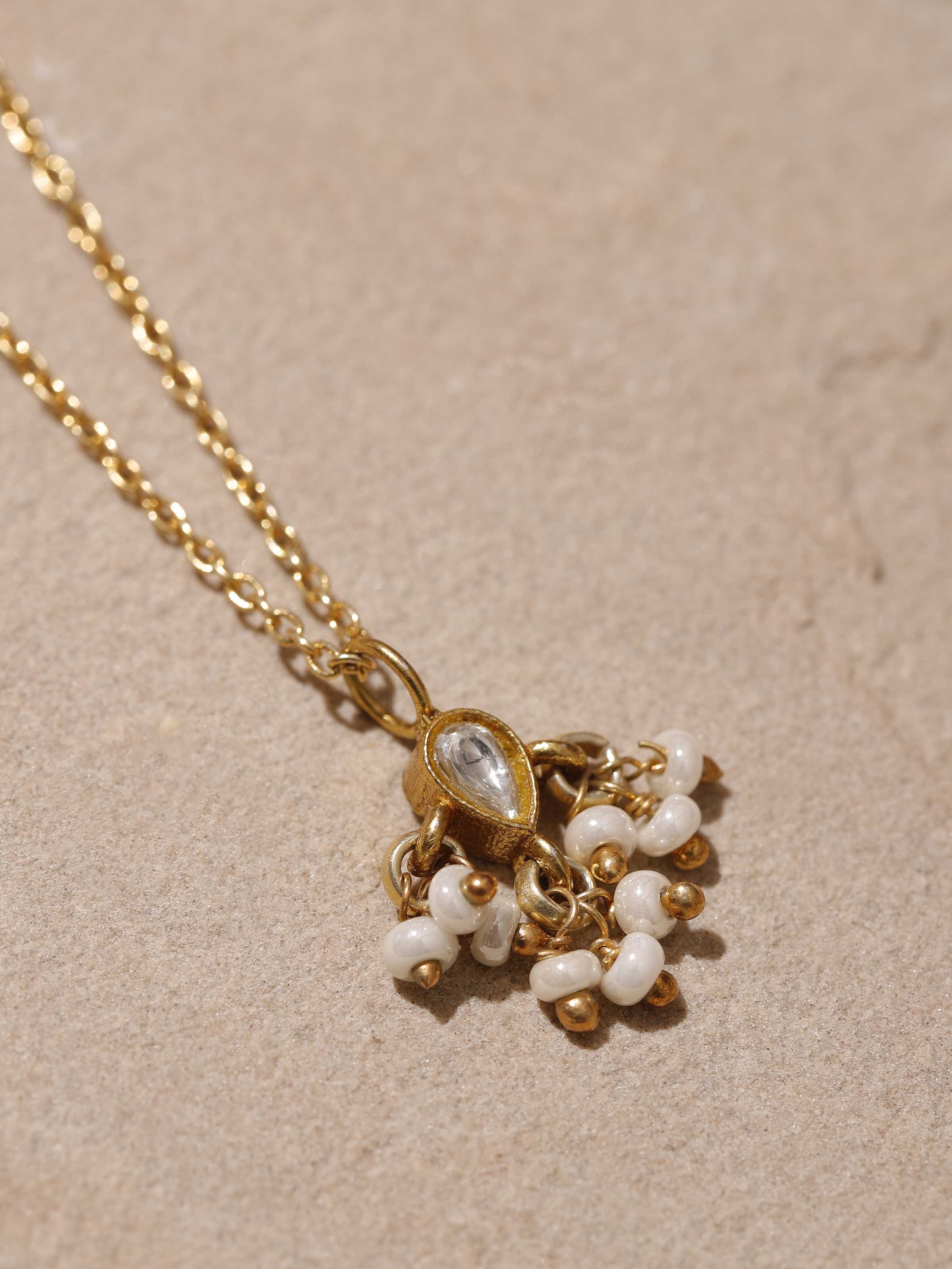 Side view of Silver Smithing Pendant & Chain Gift Set displaying the smooth finish and detailed silverwork.