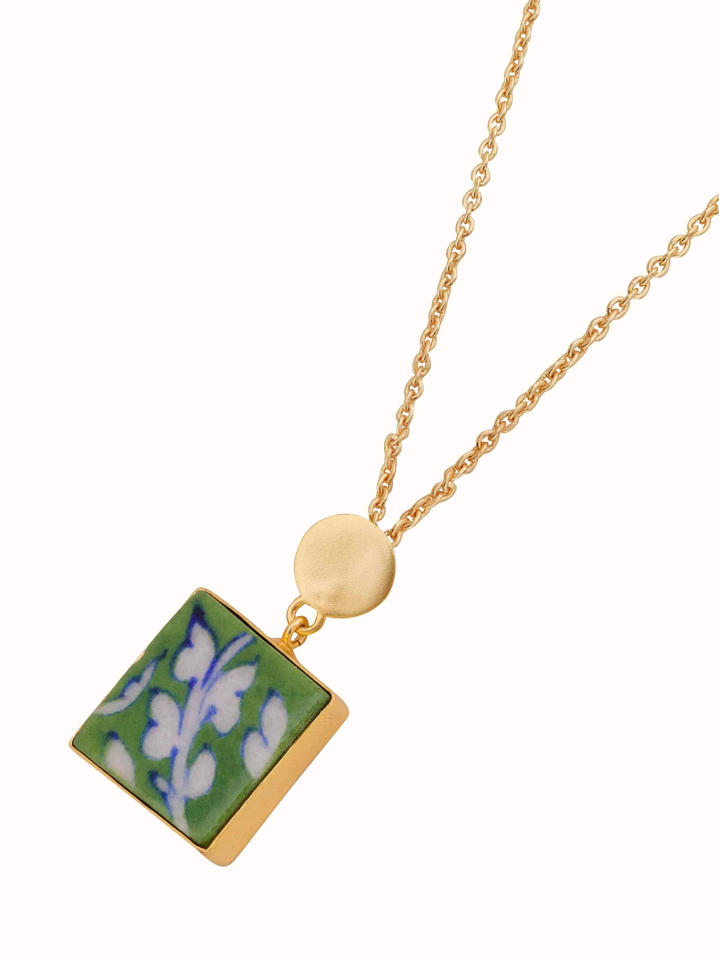 Angled view of Blue Pottery Pendant & Chain emphasizing the pendant's unique shape and chain design