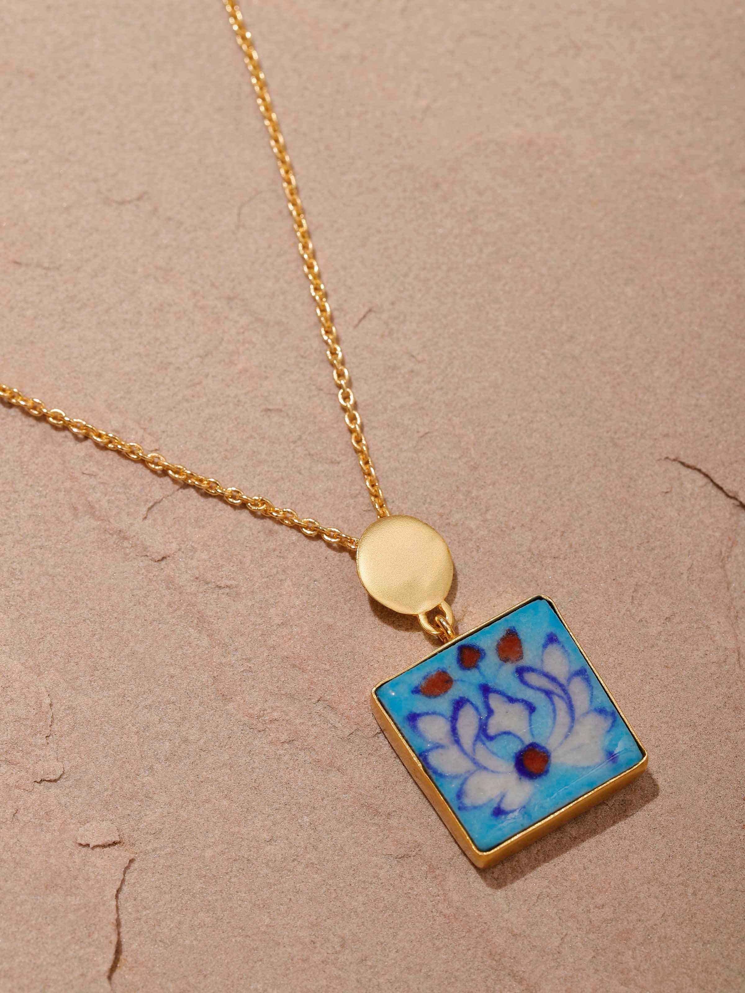 Detailed view of Blue Pottery Pendant & Chain highlighting the fine craftsmanship and vibrant blue pottery design