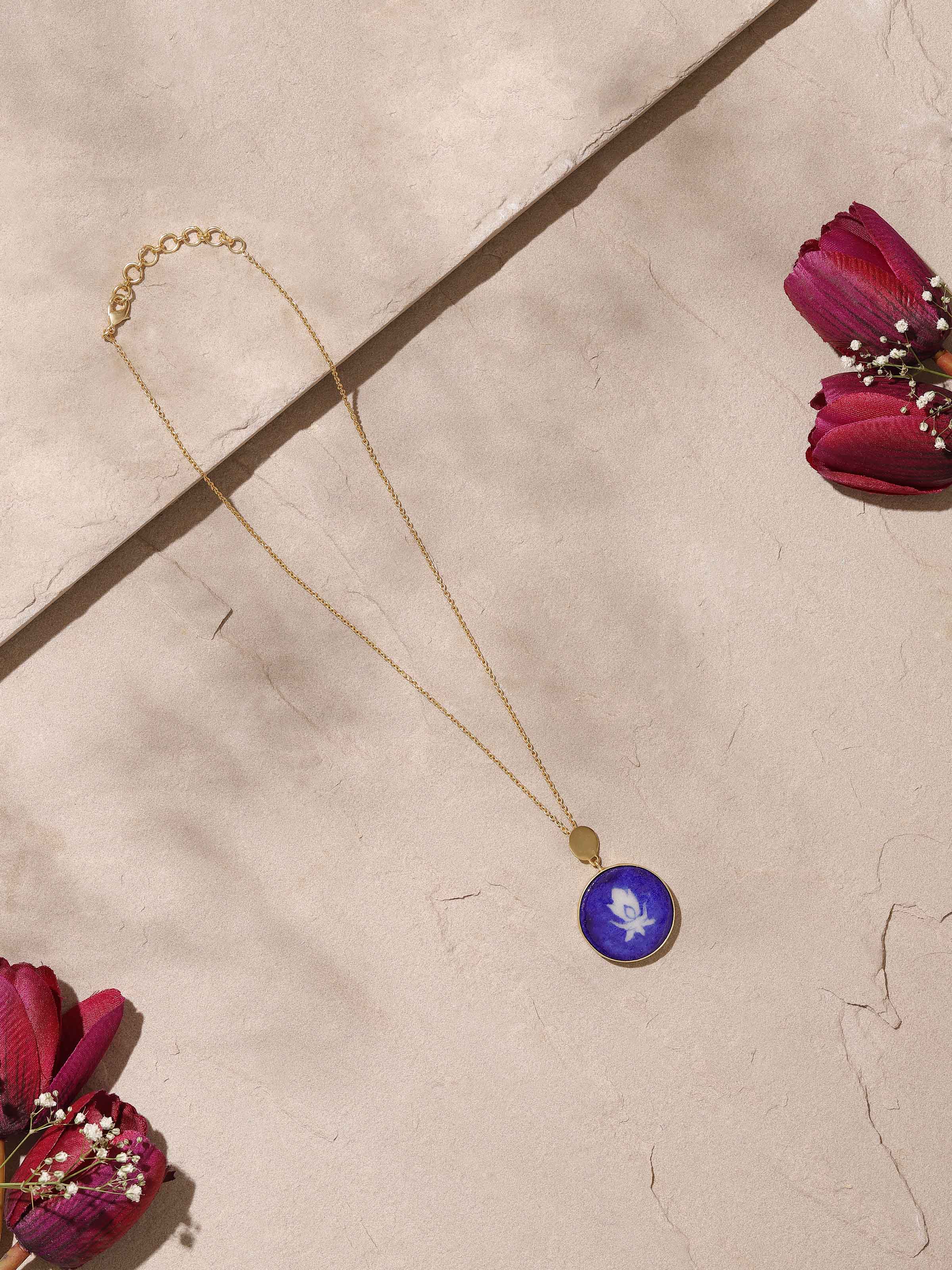 Side view of Blue Pottery Pendant and Chain highlighting the elegant blue pottery and delicate chain by Swadesh