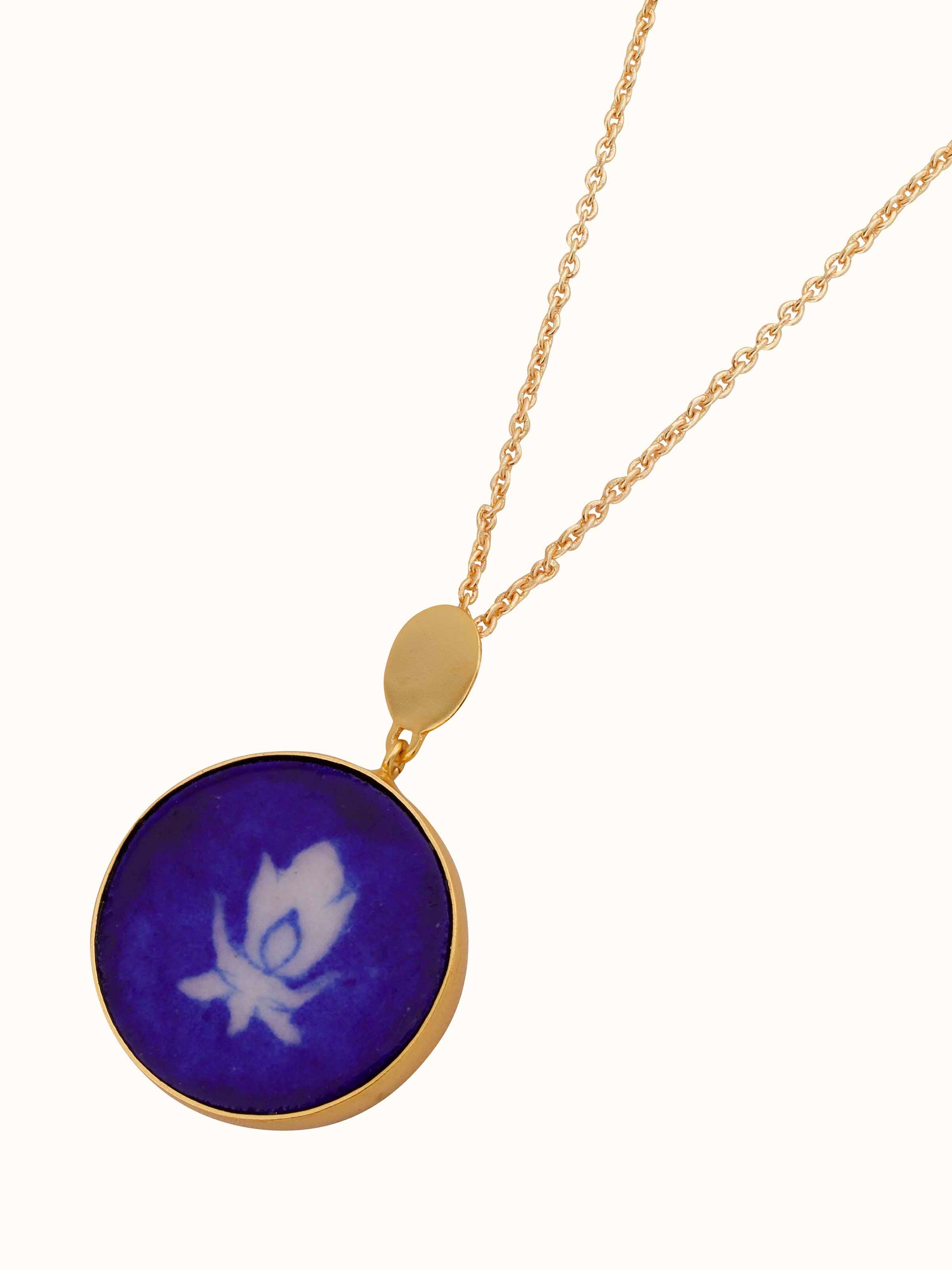 Close-up view of Blue Pottery Pendant and Chain emphasizing the detailed blue pottery work and fine chain by Swadesh