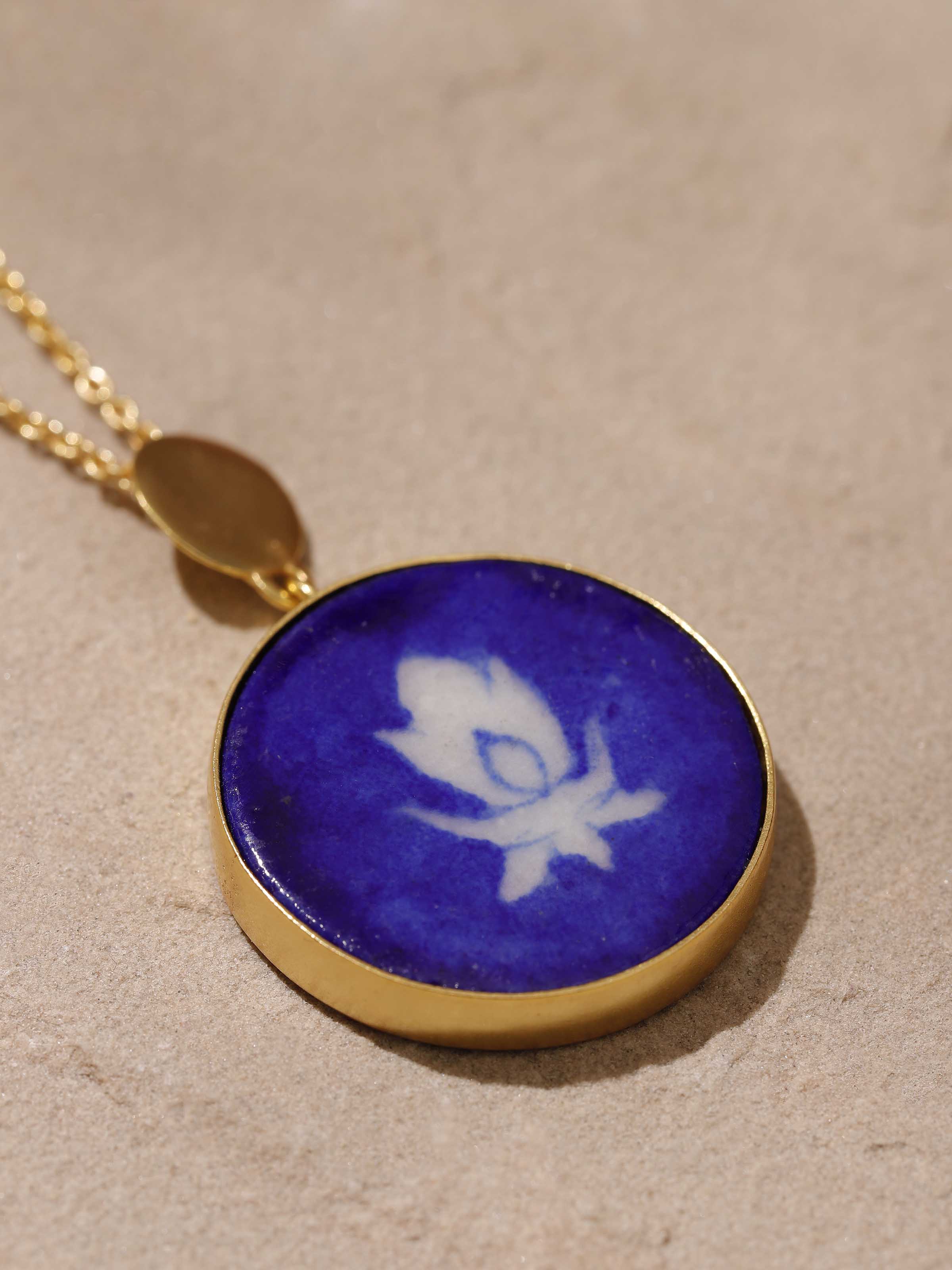 Back view of Blue Pottery Pendant and Chain showcasing the smooth finish and clasp details by Swadesh