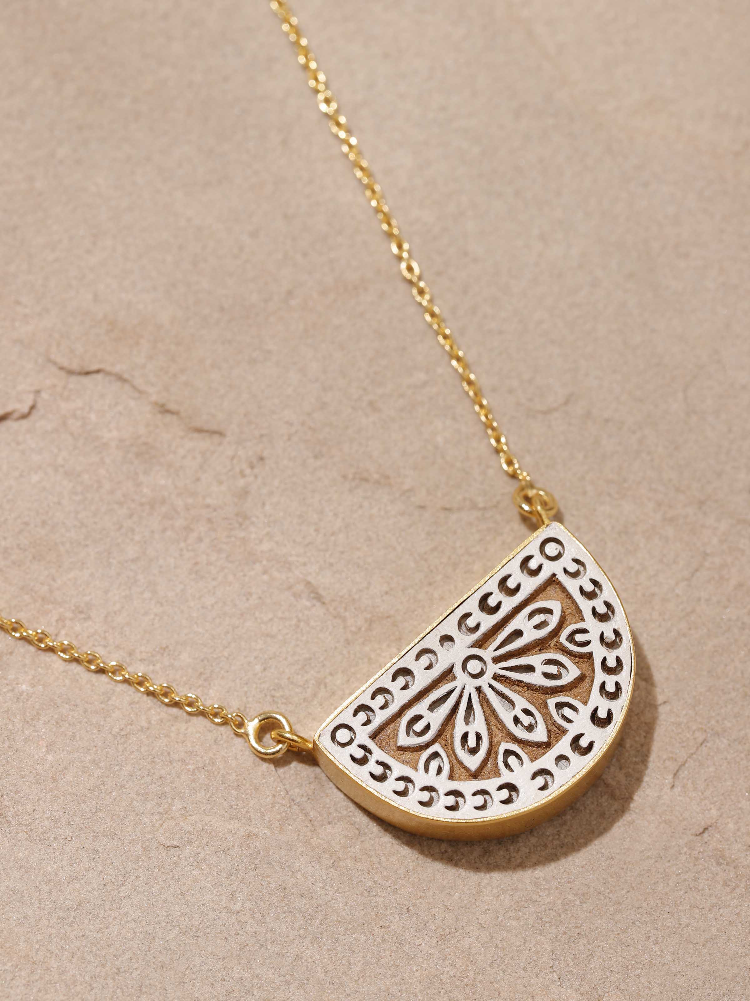 Close-up of Teakwood Pendant & Chain showcasing its polished surface by Swadesh