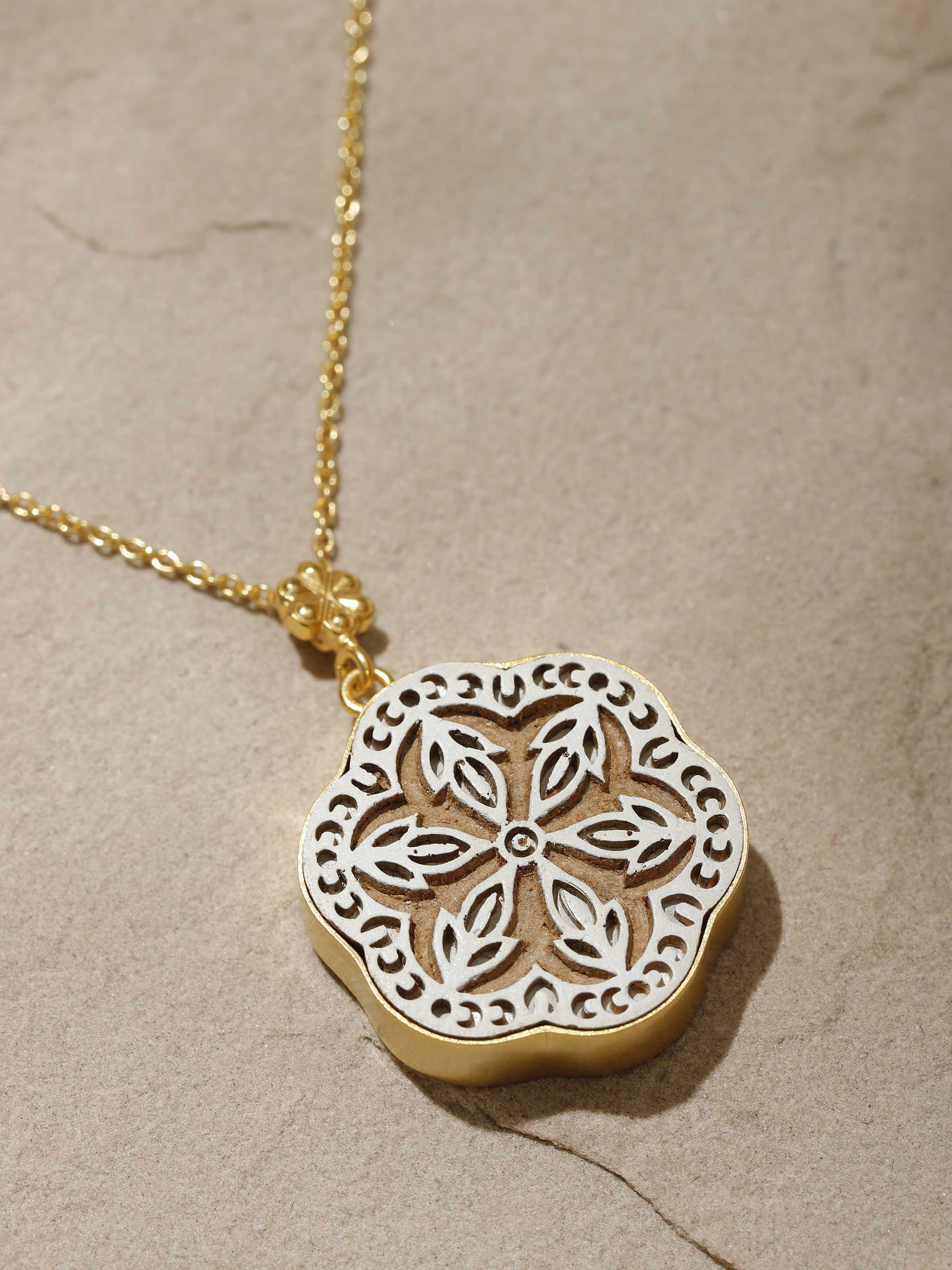 Detailed view of Teakwood Pendant and Chain emphasizing the pendant's texture and wood details