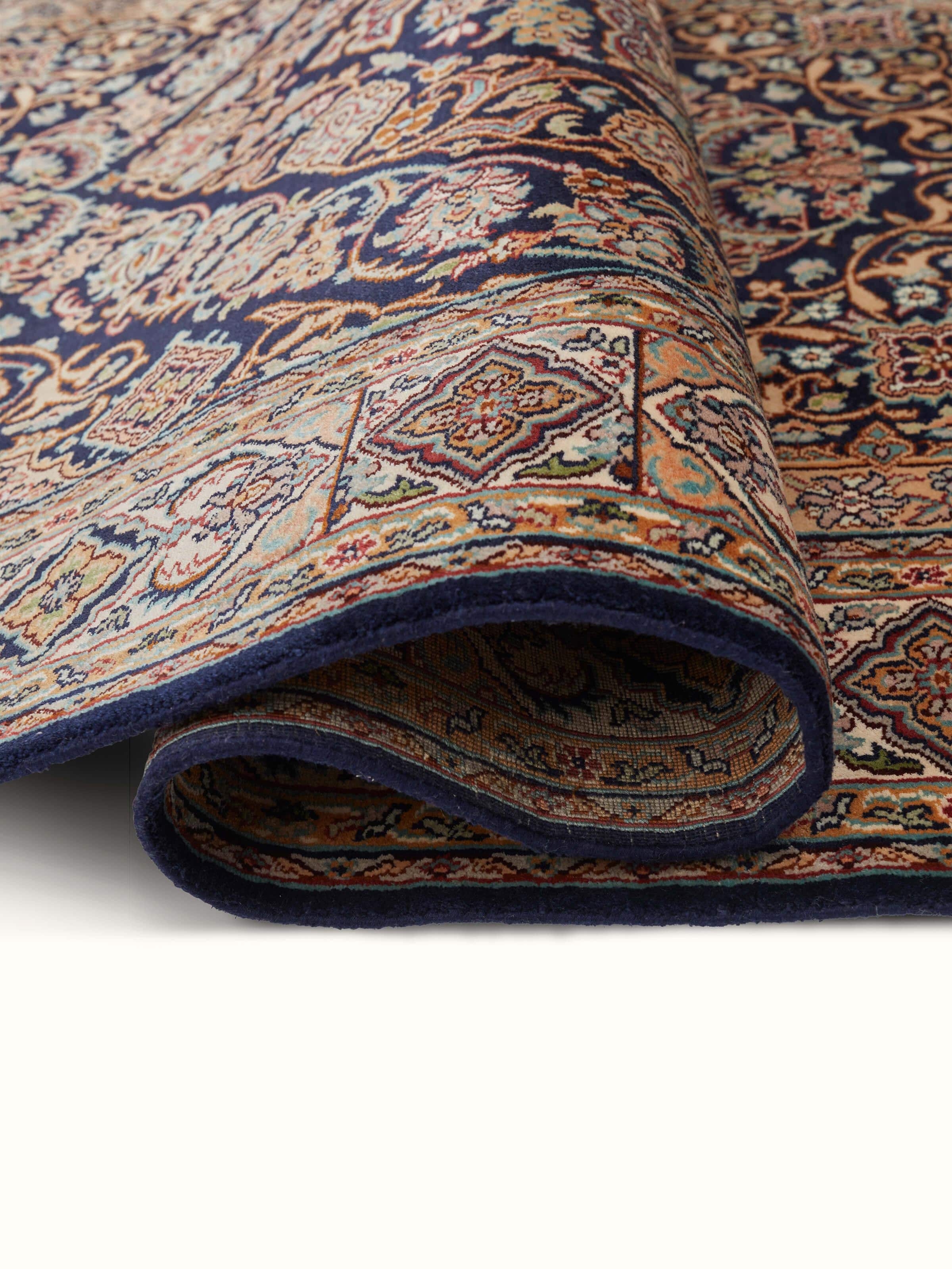 Detailed view of Traditional Persian Sadakdar Kashmir silk hand-knotted carpet emphasizing the intricate knotting and pattern