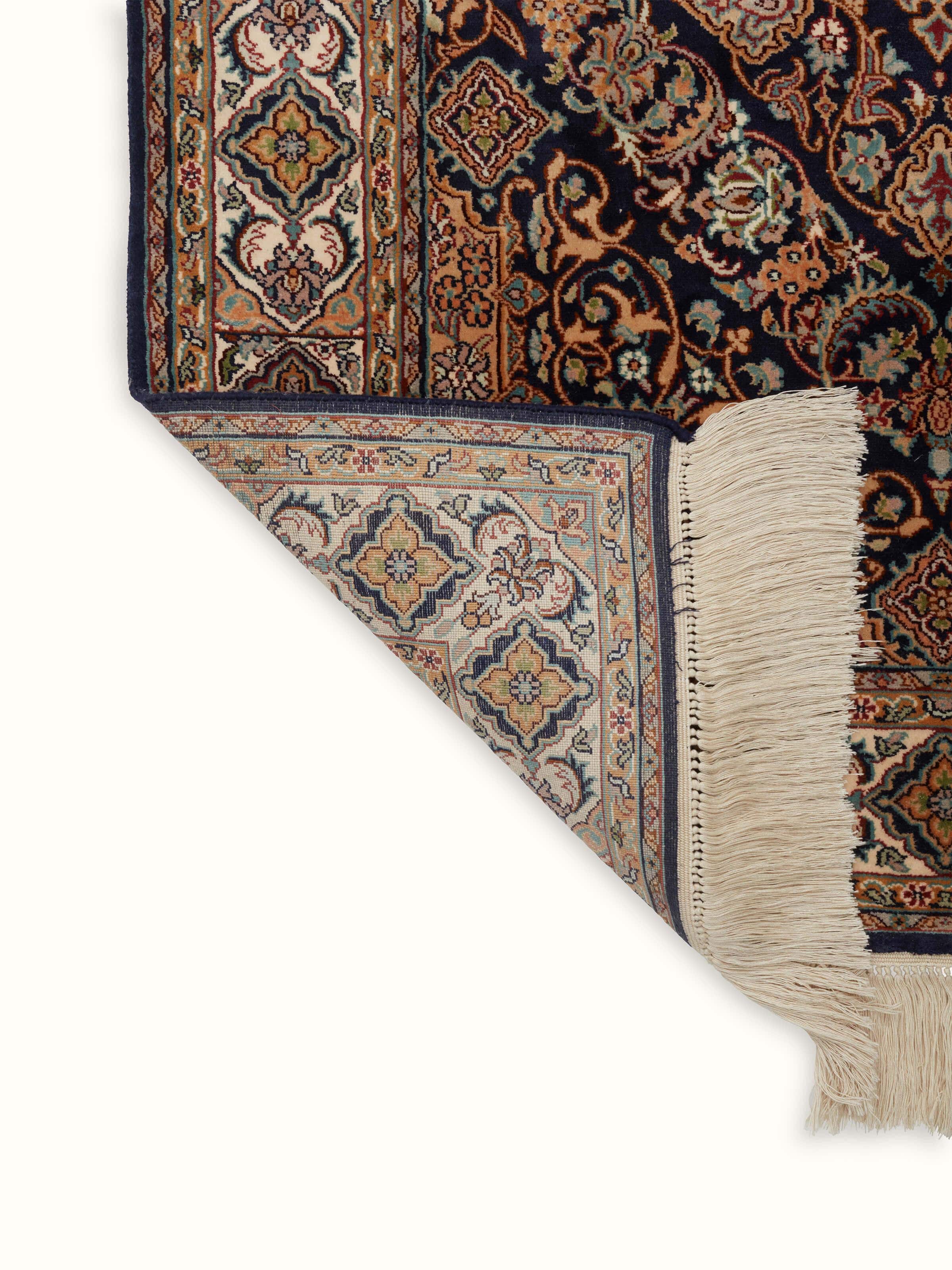 Full view of Traditional Persian Sadakdar Kashmir silk hand-knotted carpet laid out to showcase its design and scale