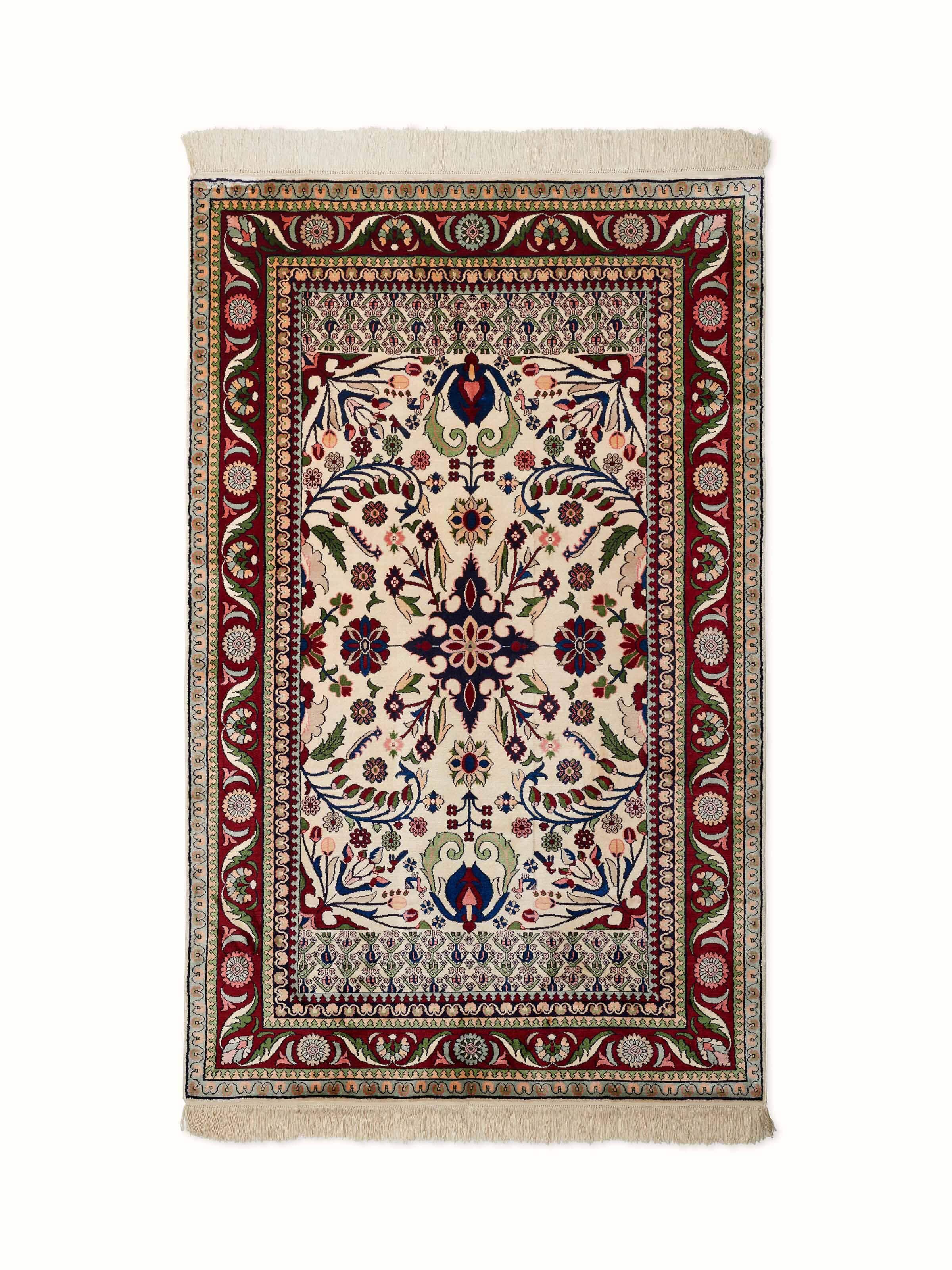 Front view of Traditional Persian Isfahan Kashmir silk hand-knotted carpet showcasing intricate floral motifs