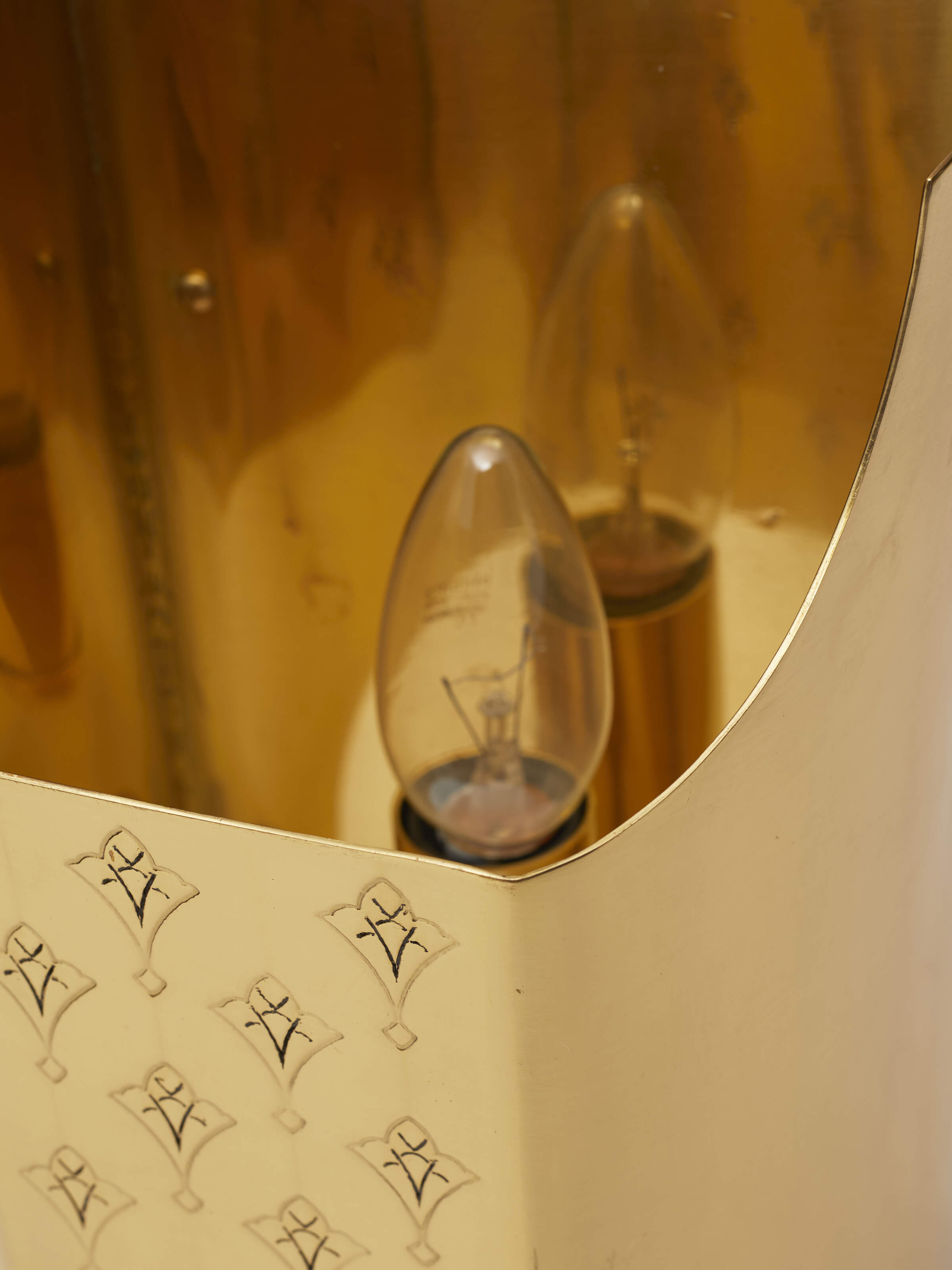 Detail view of Brassware Wall Light showcasing its design intricacies and functional features.