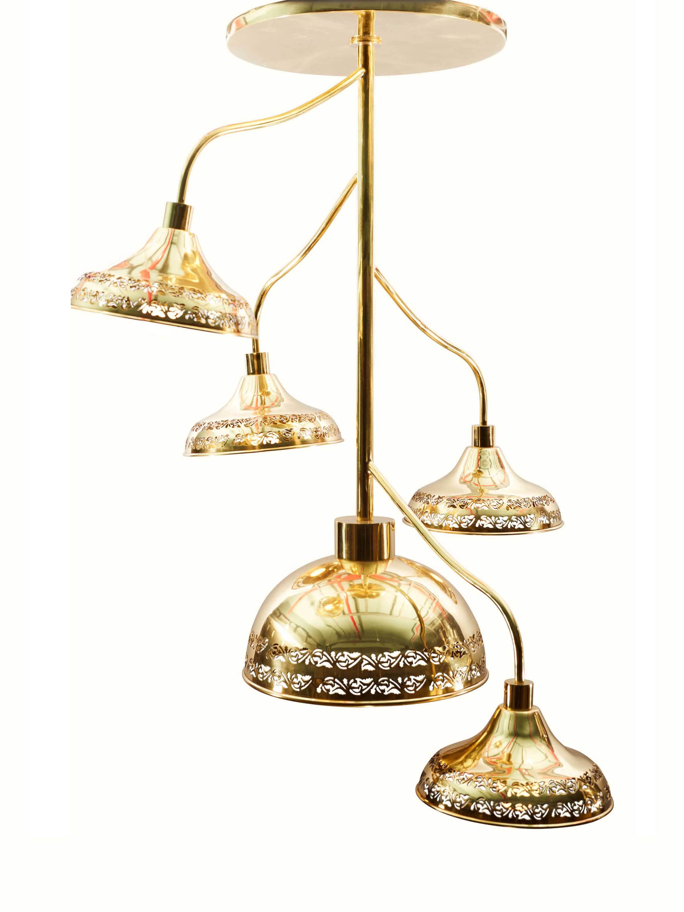 Side view of Brass Nakkashi Cluster Light showcasing its brass details and lighting effect.