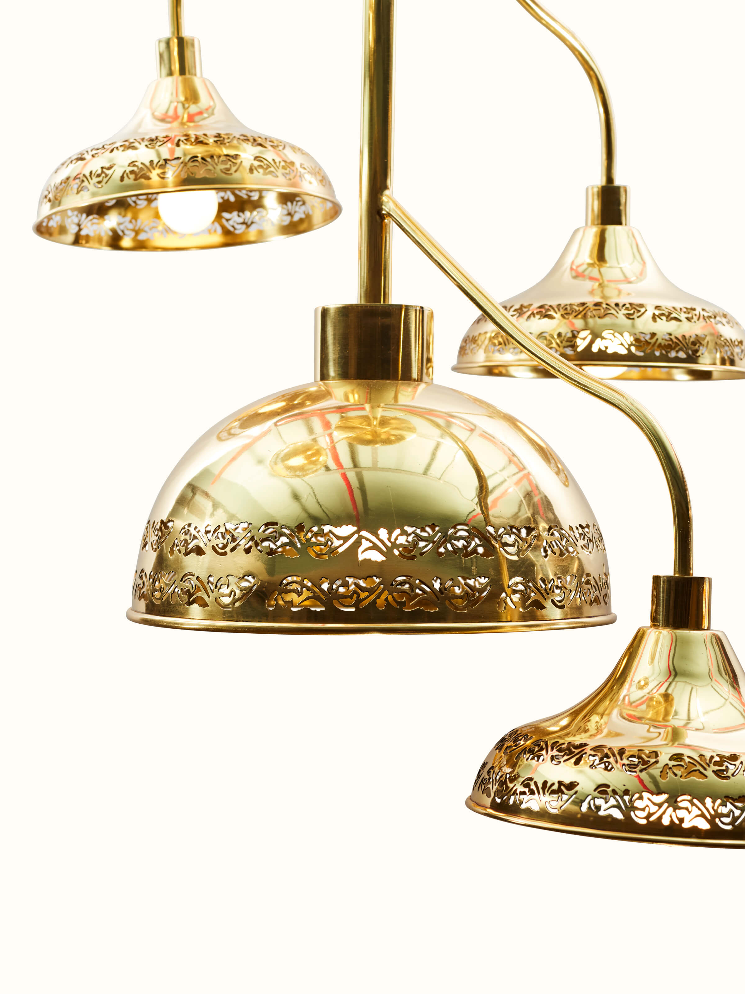 Detail view of Brass Nakkashi Cluster Light focusing on the intricate brasswork and design elements.