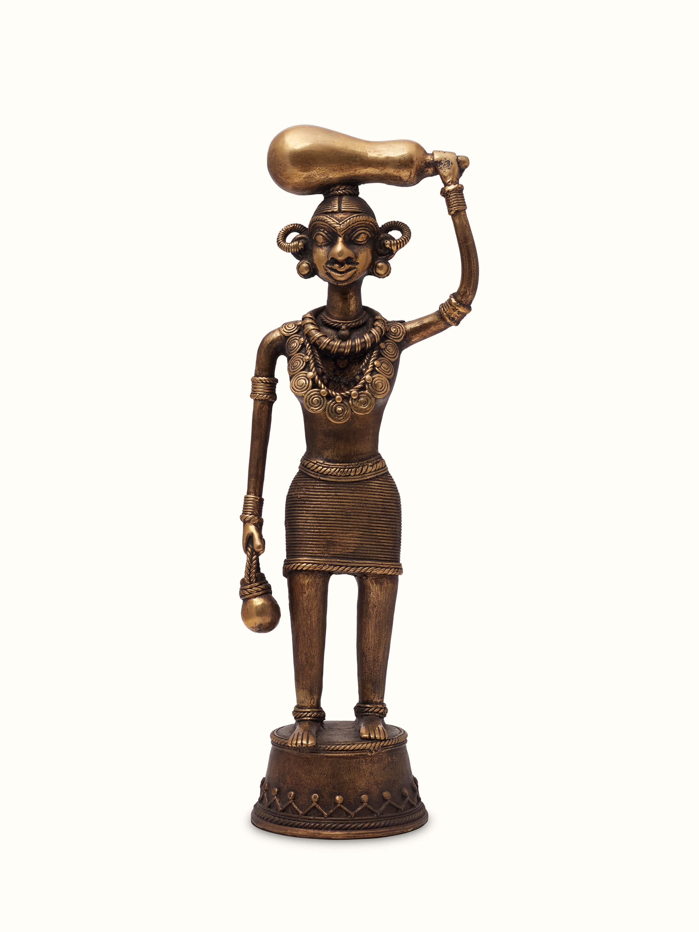Front view of Dhokra Brass Tribal Woman Figurine, showcasing a beautifully crafted brass figure of a tribal woman with intricate details.