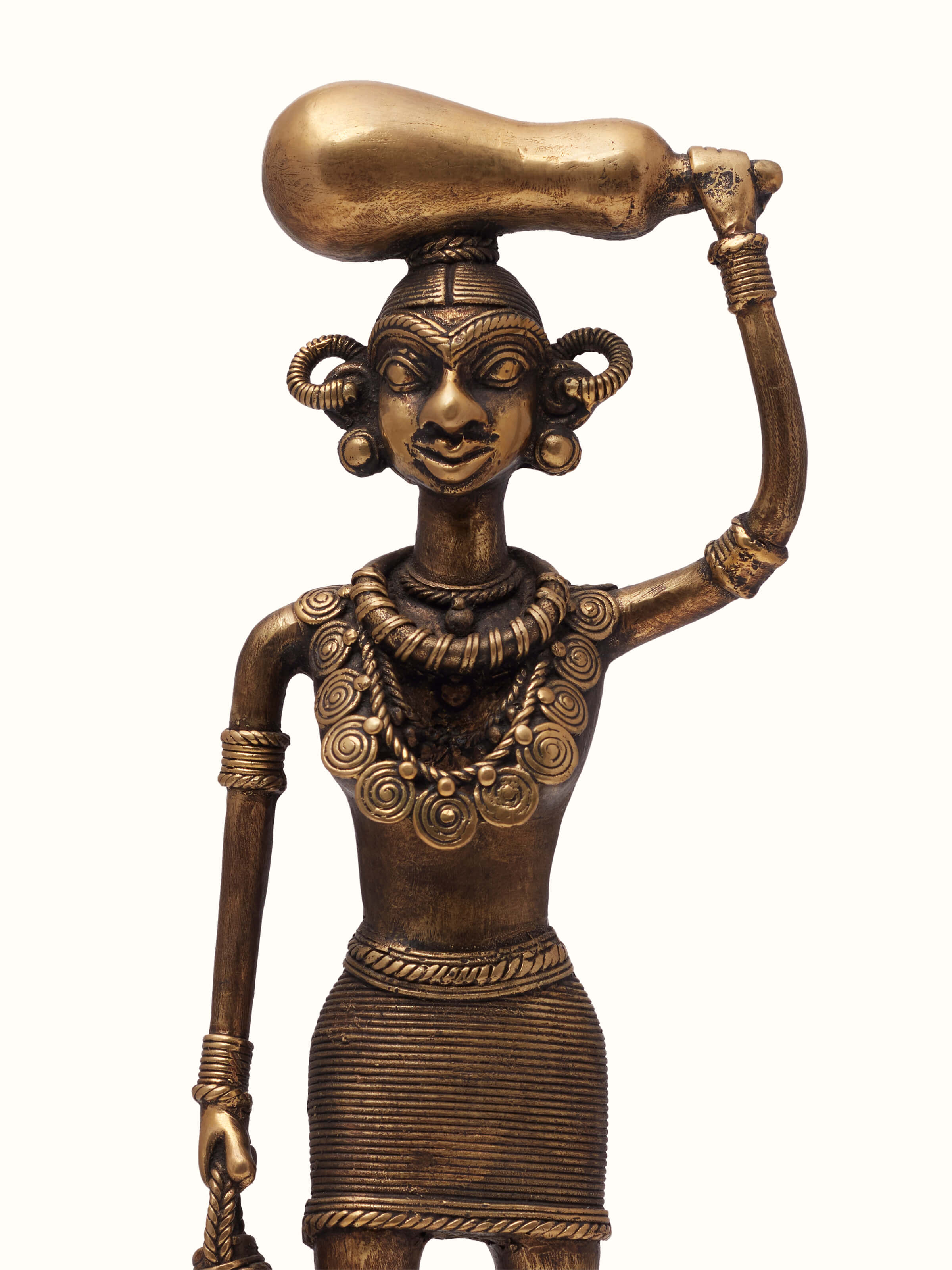 Close-up view of Dhokra Brass Tribal Woman Figurine, emphasizing the fine craftsmanship and natural texture of the brass figure.