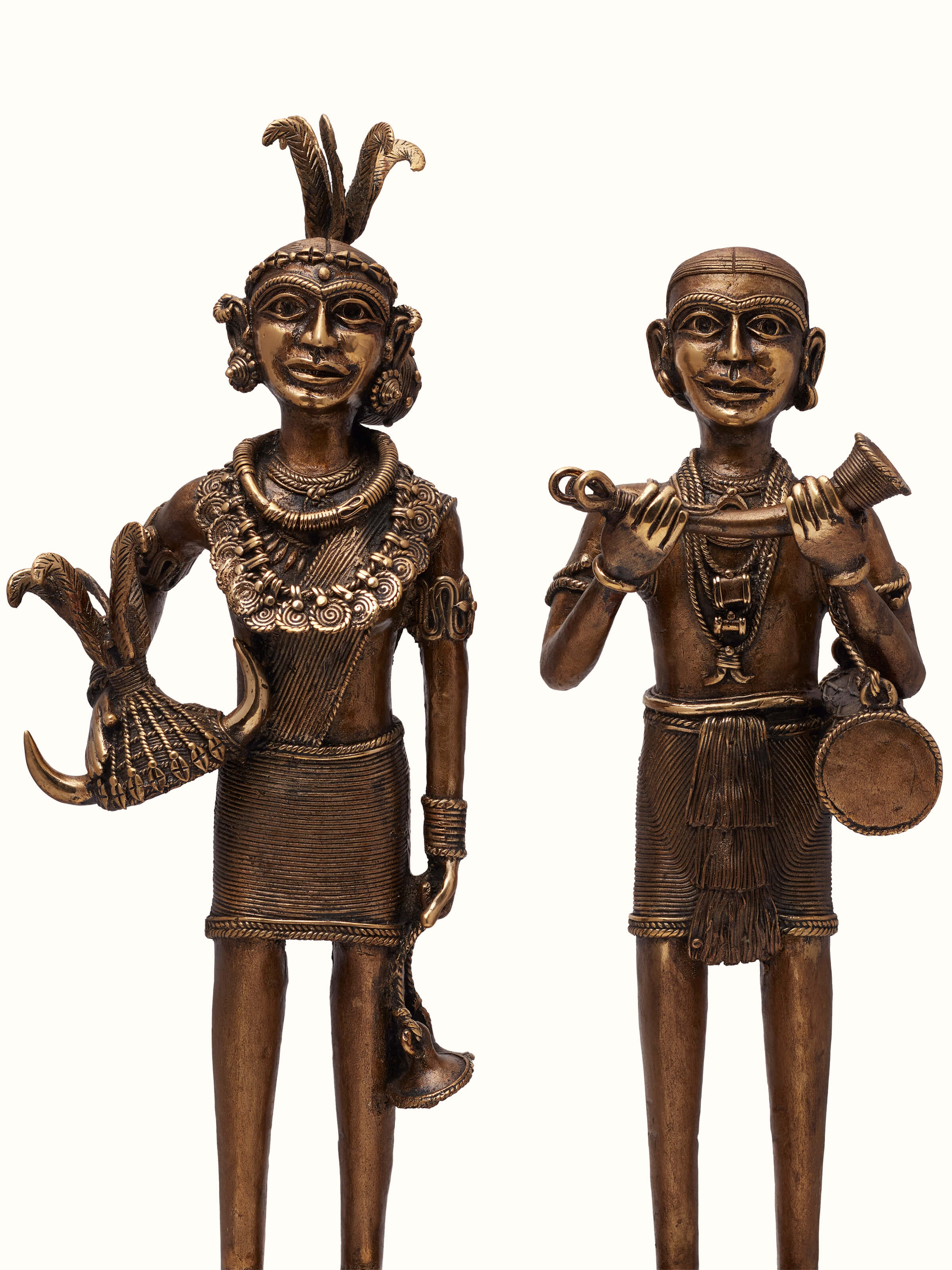 Close-up view of Dhokra Brass Ghotul couple artpiece highlighting the fine detailing and traditional craftsmanship.