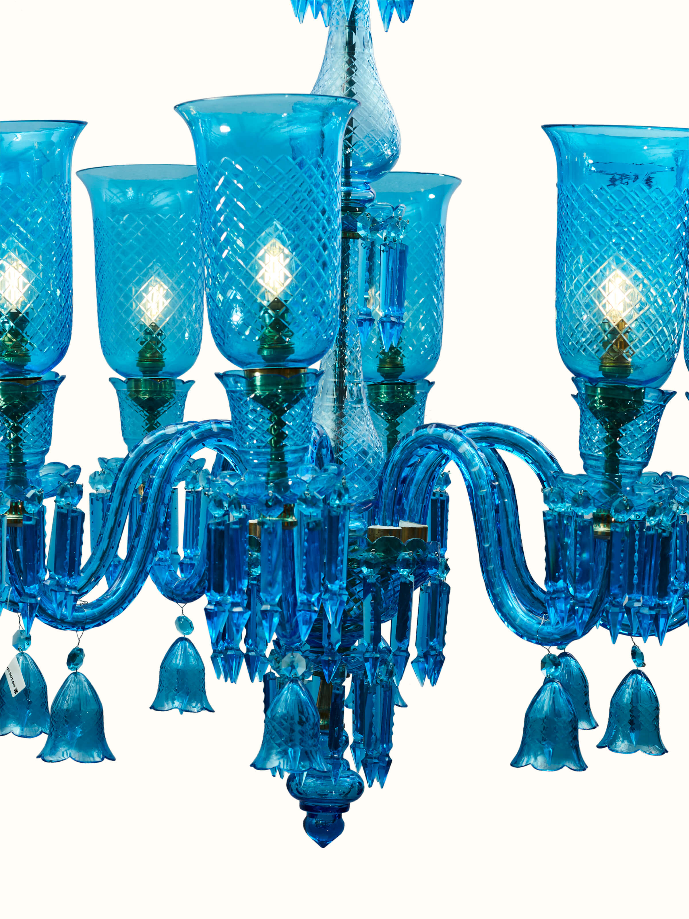 Close-up of Blue Glass Chandelier focusing on the detailed blue glass and craftsmanship.