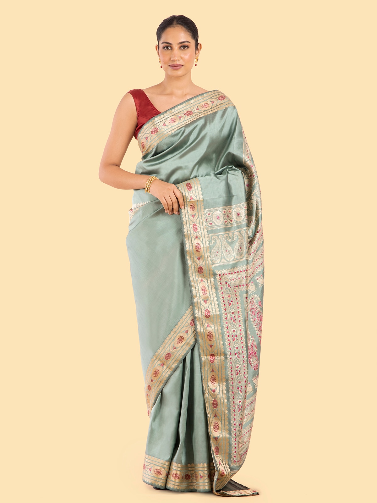 Side view of Sage green mulberry silk Baluchari saree showcasing fabric texture