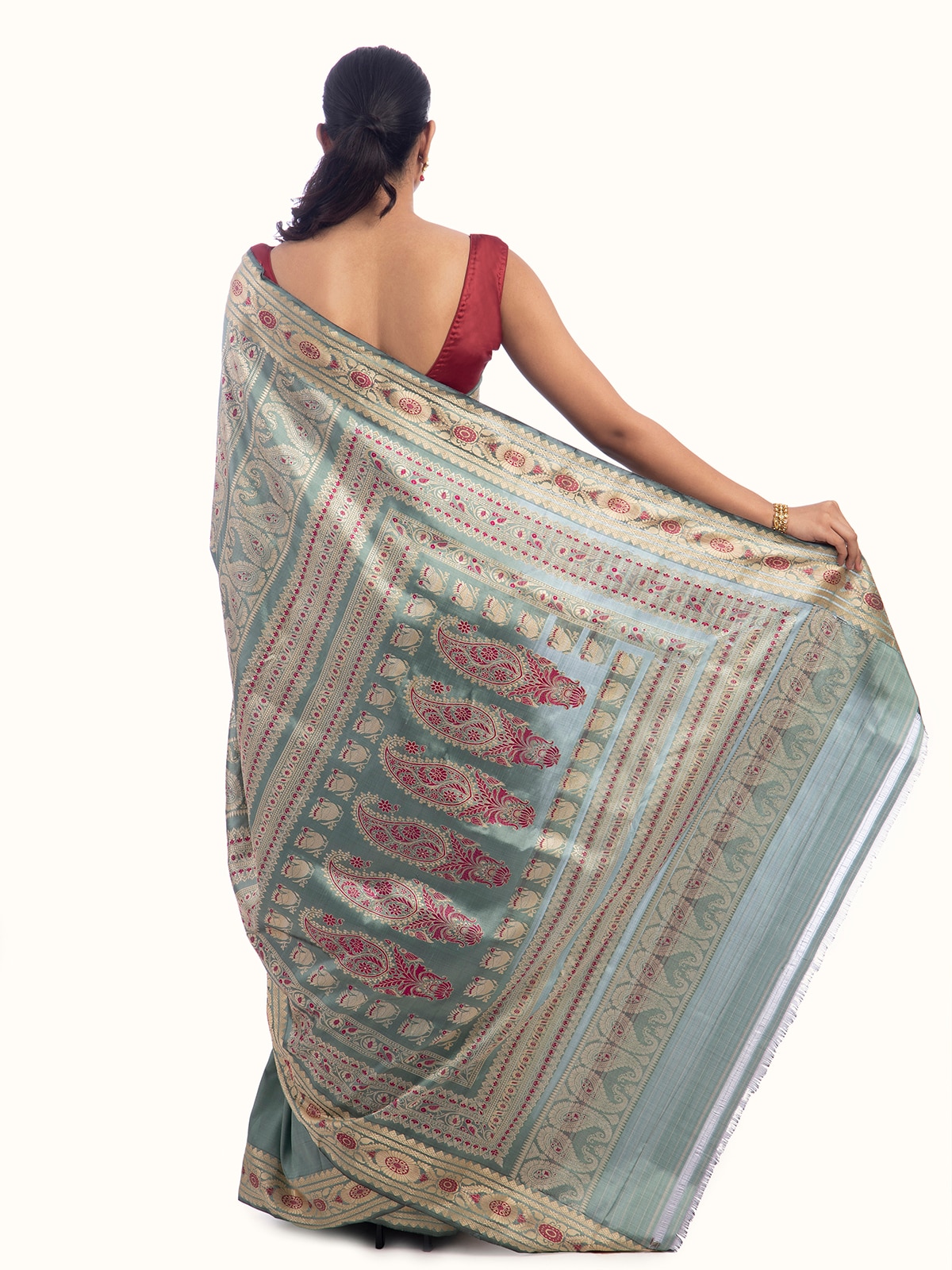 Close-up view of Sage green mulberry silk Baluchari saree with detailed patterns