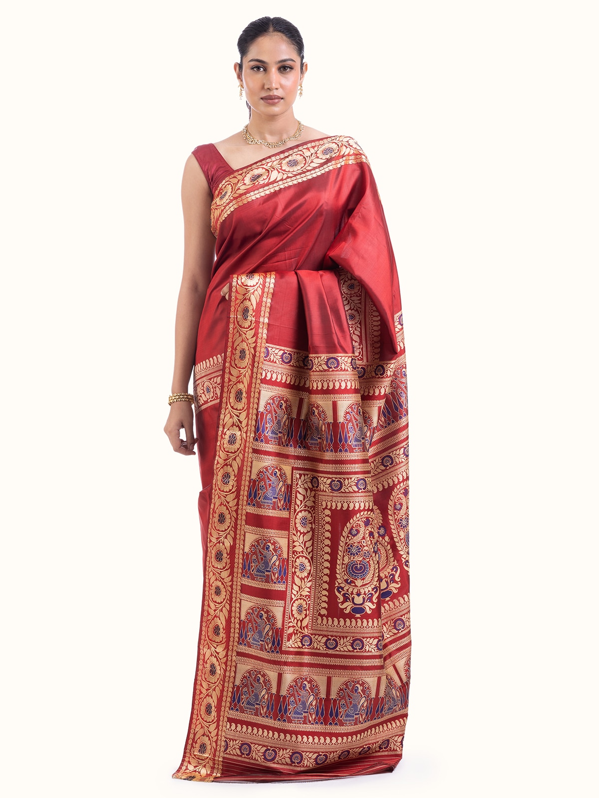 Front view of red mulberry silk Baluchari saree showcasing traditional embroidery and rich color