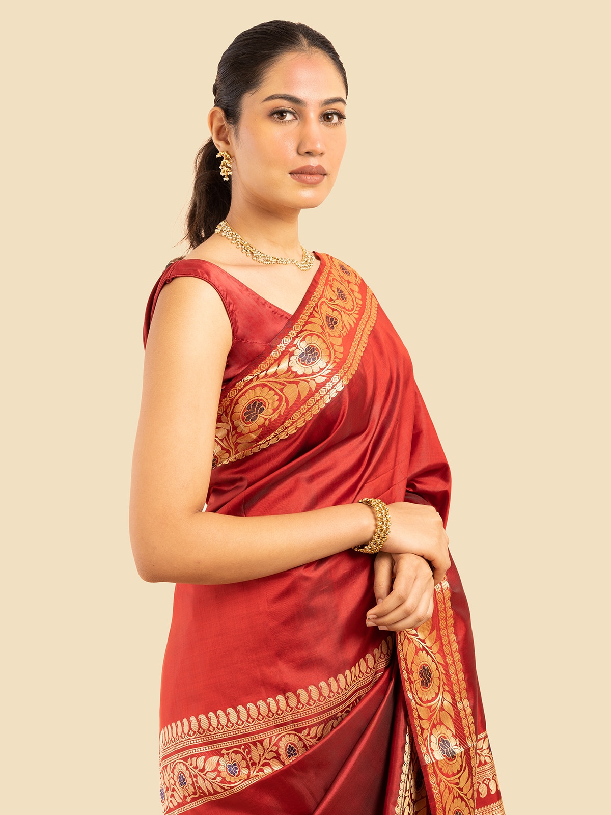 Back view of red mulberry silk Baluchari saree displaying the overall design and craftsmanship
